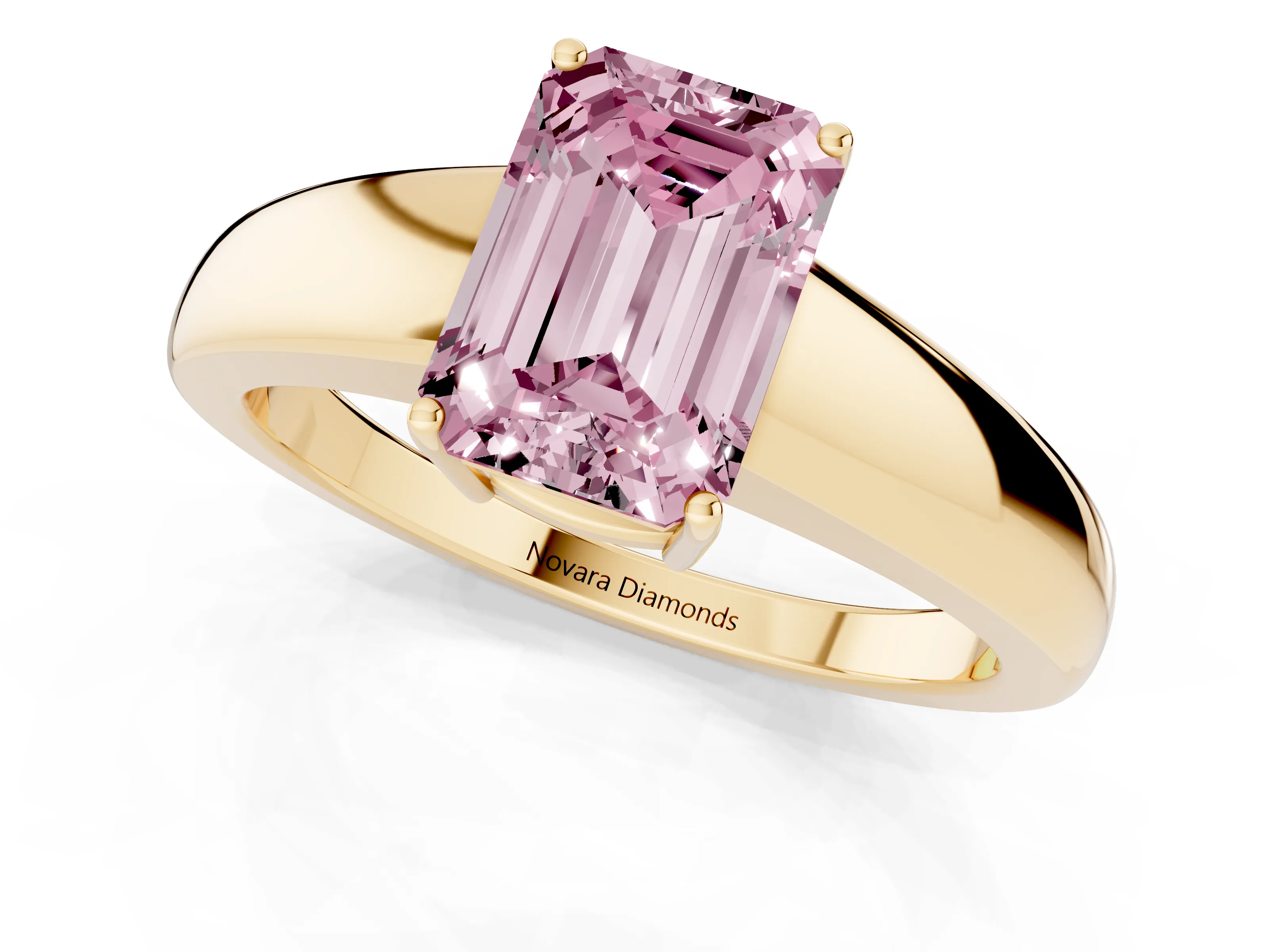Fancy Pink Emerald Cut Diamond Solitaire Ring Set in Yellow gold with Tapered Band and Prong Setting