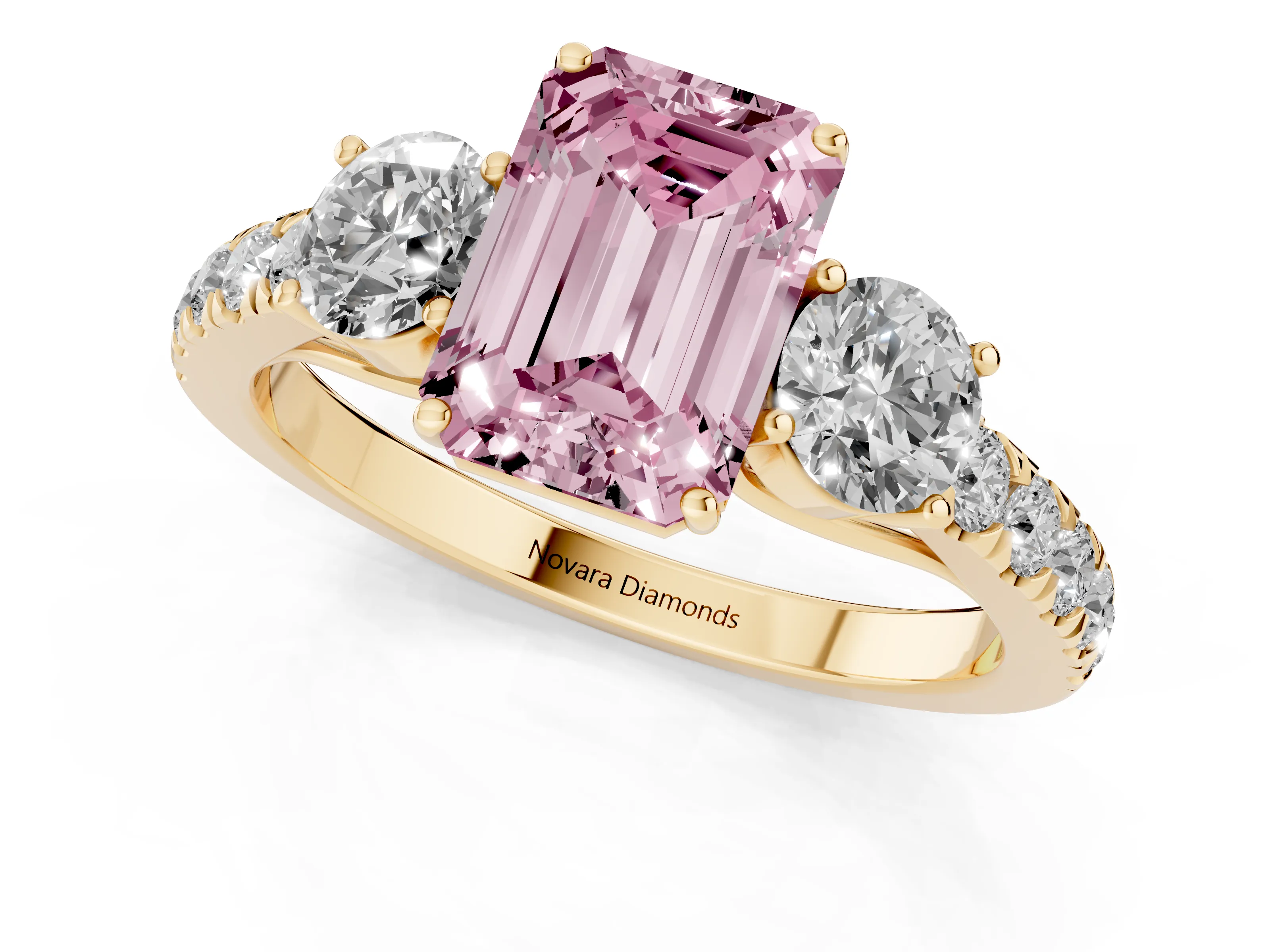 Fancy Pink Emerald Cut Diamond Three-Stone Ring Set in Yellow gold with Round Side Stones and Delicate Pavé Band