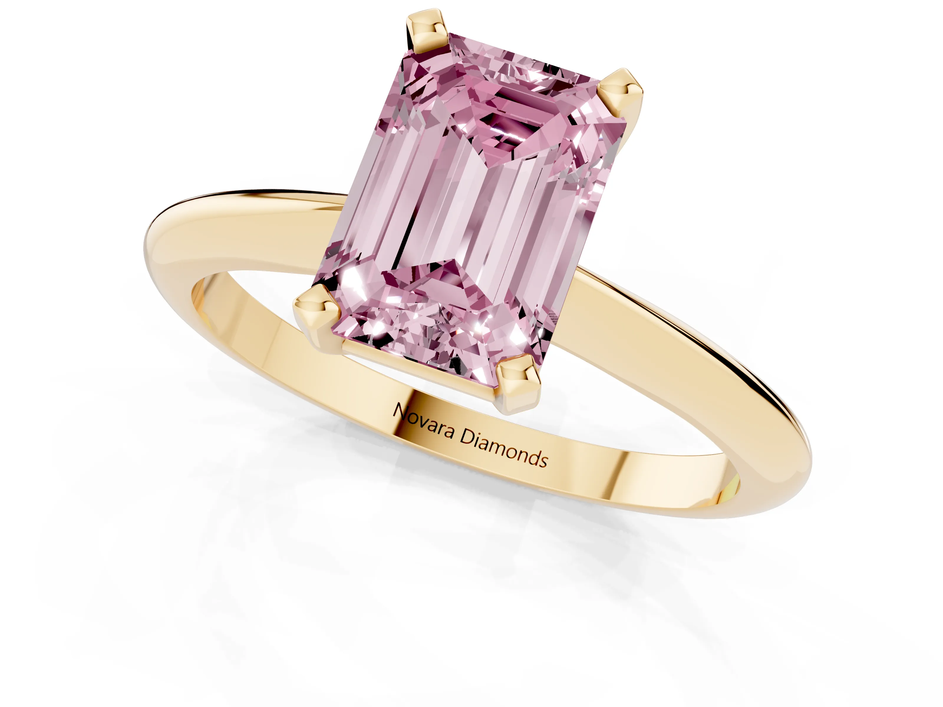 Fancy Pink Emerald Cut Diamond Solitaire Ring Set in Yellow gold with Prong Setting on a Plain Round Band