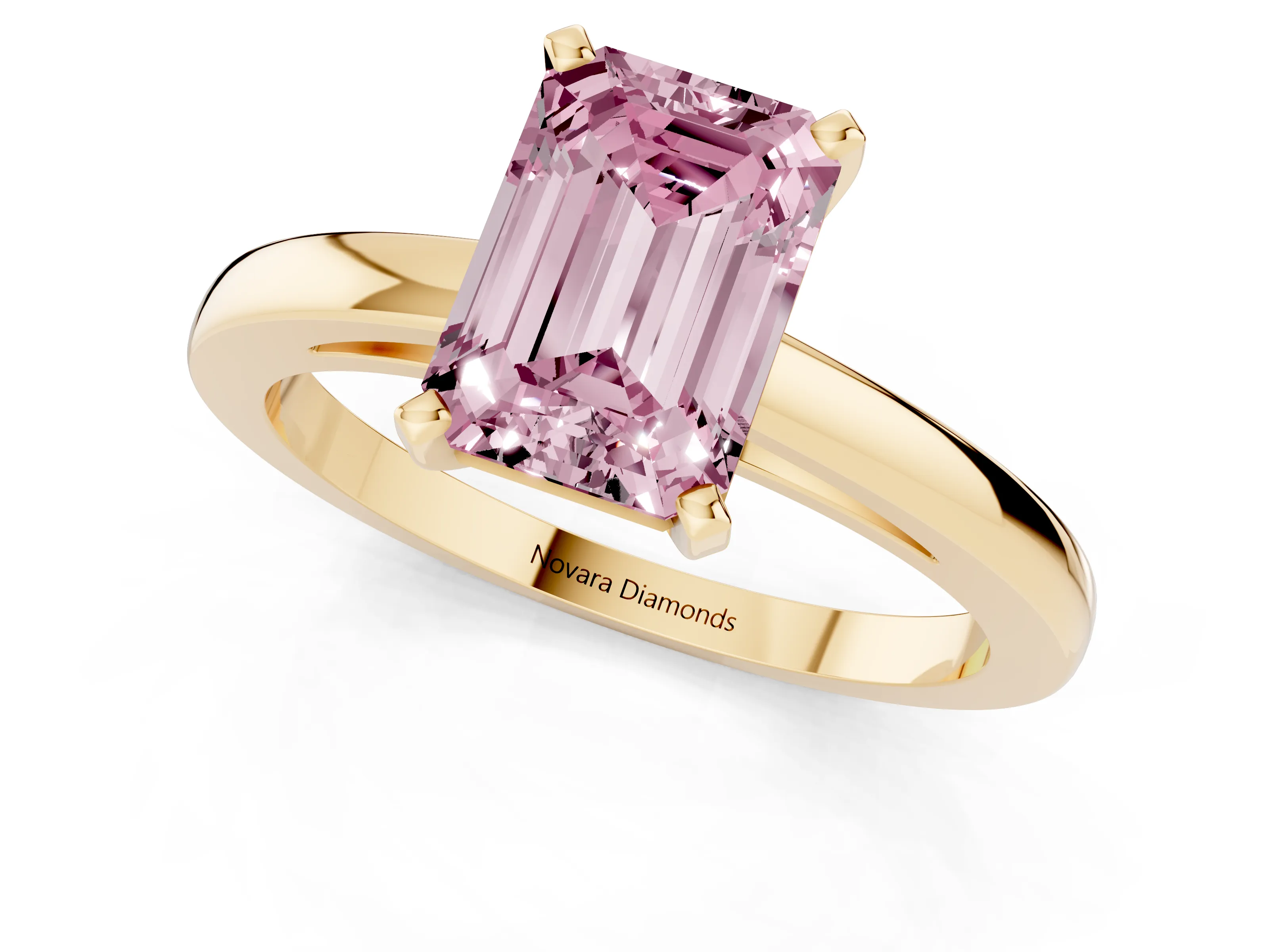 Fancy Pink Emerald Cut Diamond Solitaire Engagement Ring Set in Yellow gold with Prong Setting on a Classic Band
