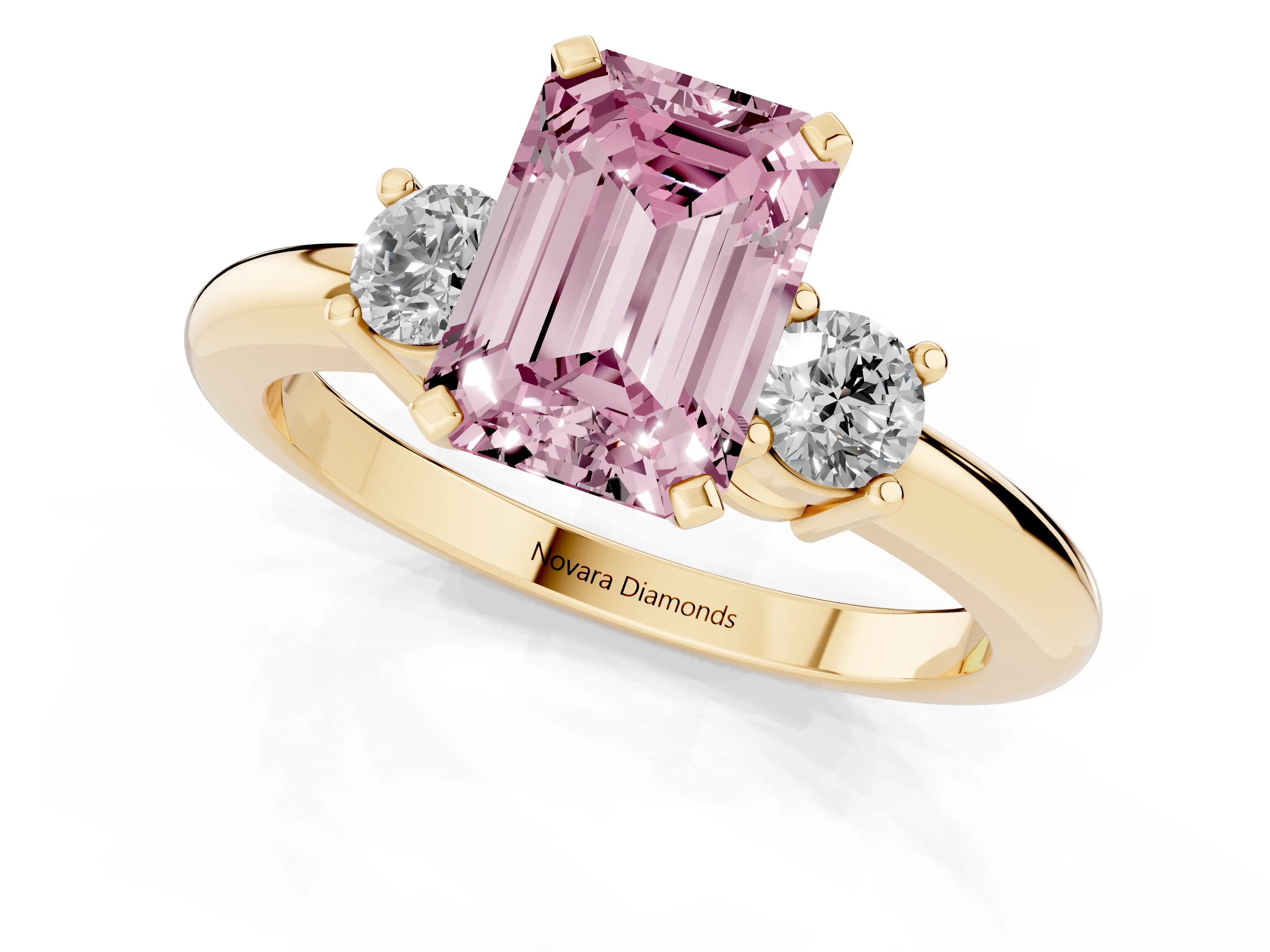 Fancy Pink Three-Stone Emerald Cut Diamond Ring Set in Yellow gold with Prong Setting and Plain Band