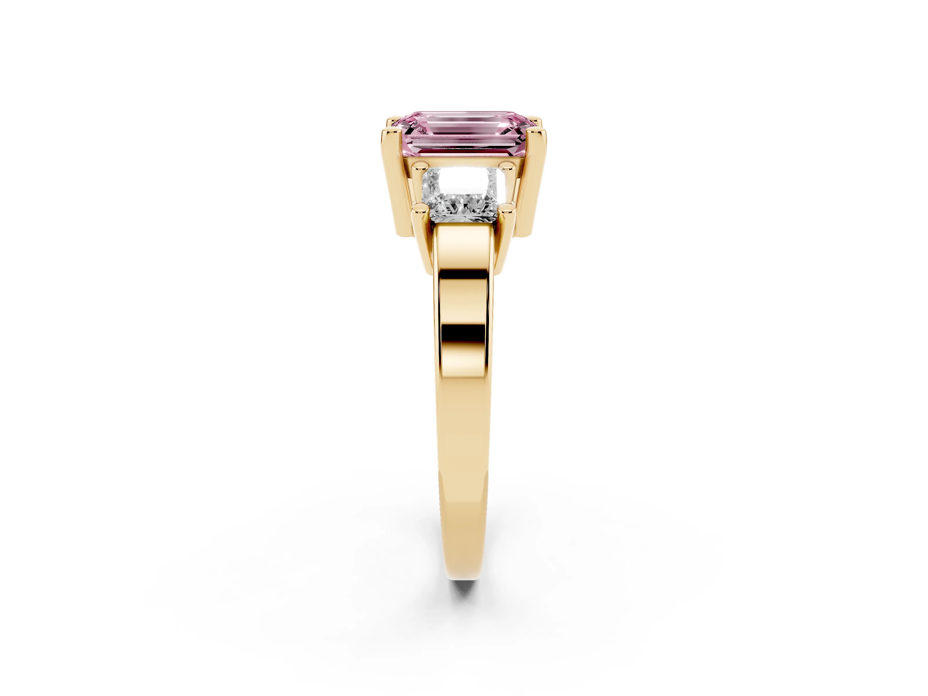 Fancy Pink Three-Stone Emerald Cut Diamond Solitaire Ring Set in Yellow gold with Prong Setting