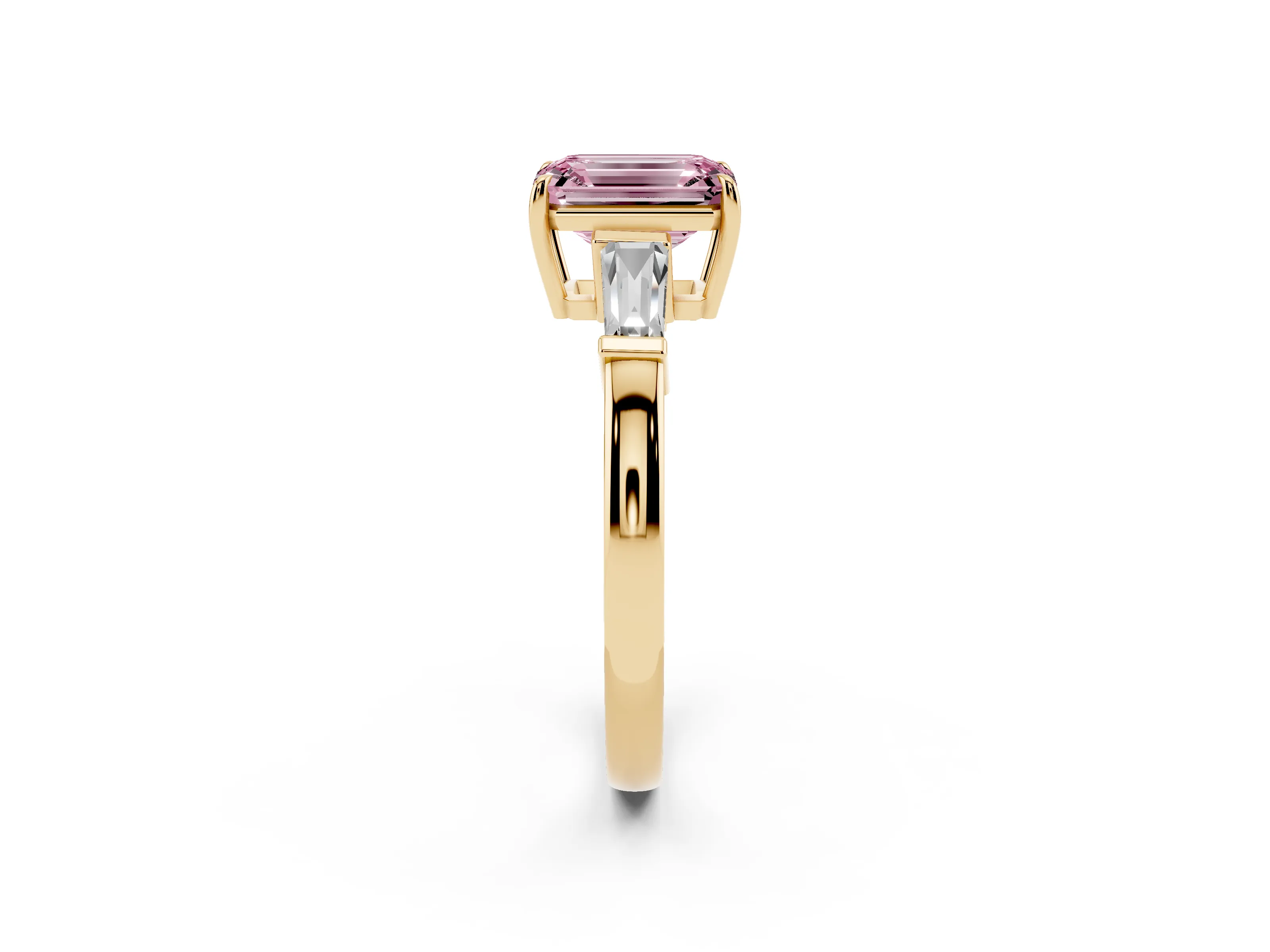 Fancy Pink Emerald Cut Diamond Three-Stone Ring Set in Yellow gold with Tapered Baguette Side Stones and Prong Setting