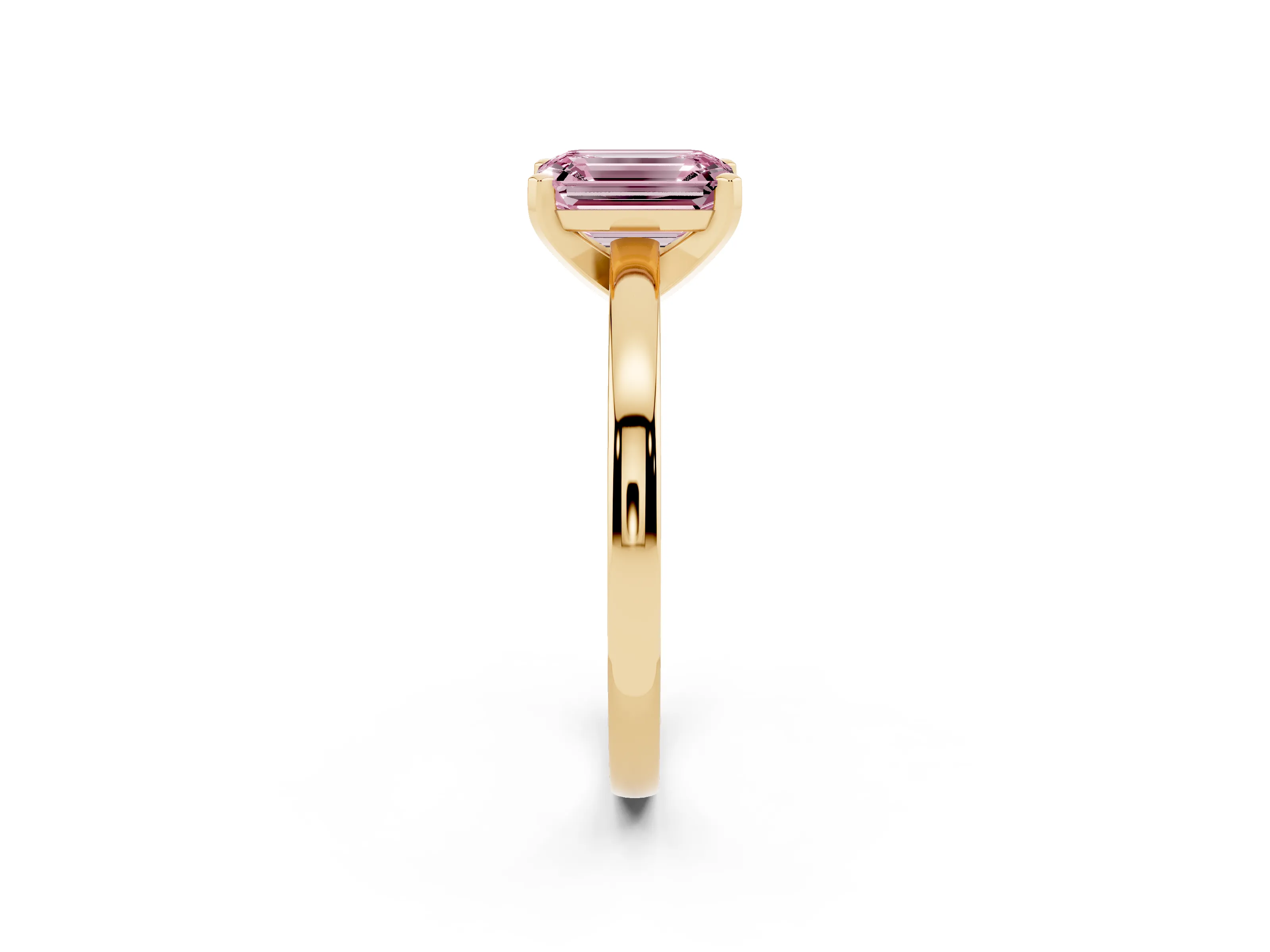 Fancy Pink Emerald Cut Diamond Solitaire Engagement Ring Set in Yellow gold with Prong Setting on a Classic Band