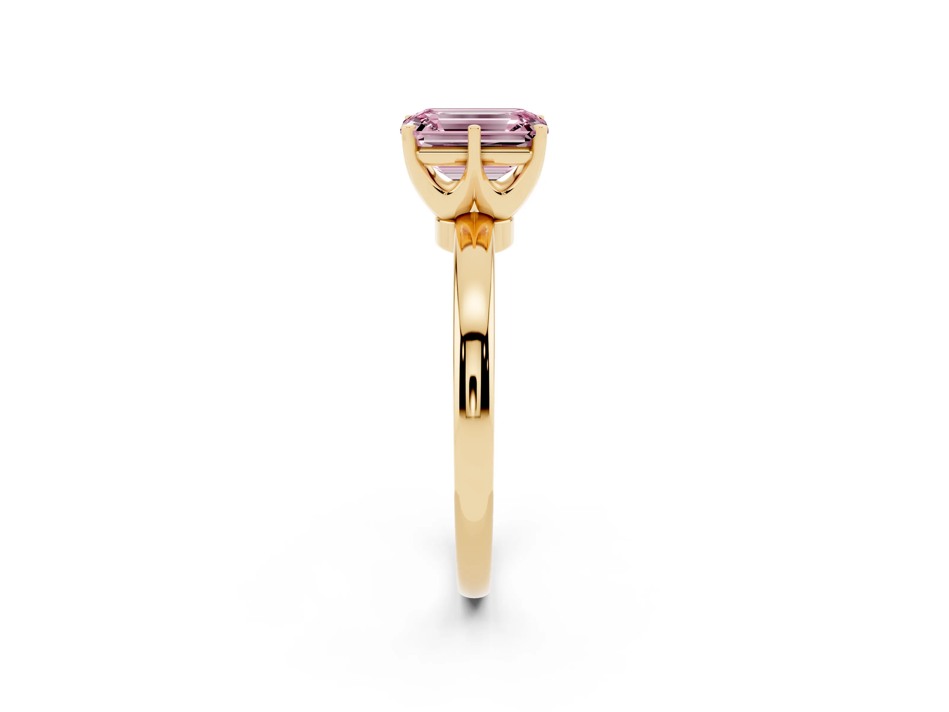 Fancy Pink Emerald Cut Diamond Solitaire Ring Set in Yellow gold with Raised Prong Setting on a Classic Band