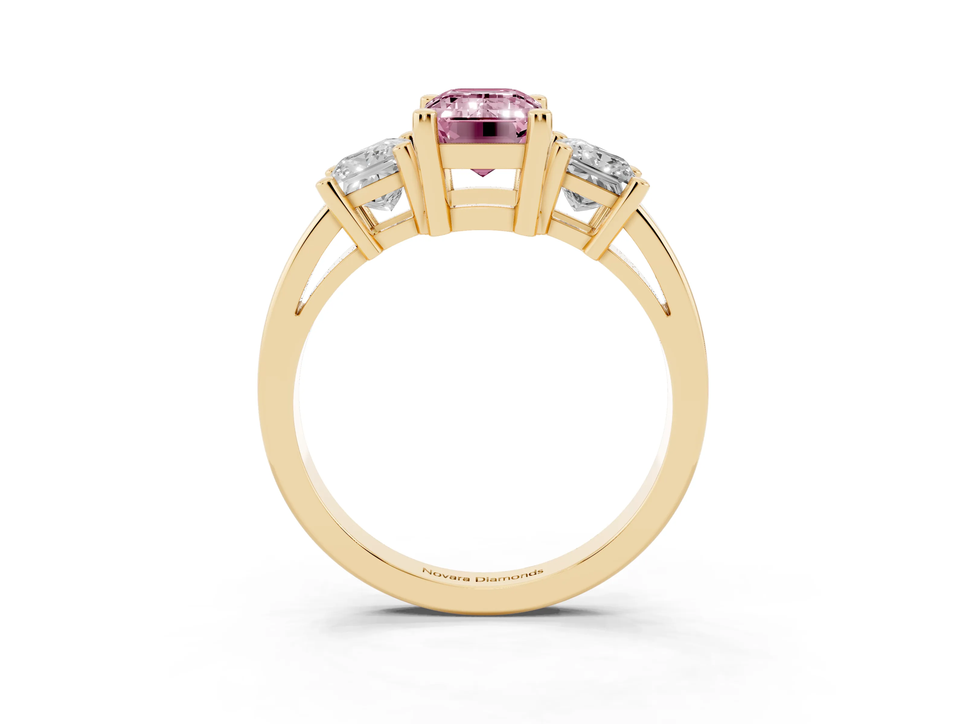 Fancy Pink Three-Stone Emerald Cut Diamond Solitaire Ring Set in Yellow gold with Prong Setting