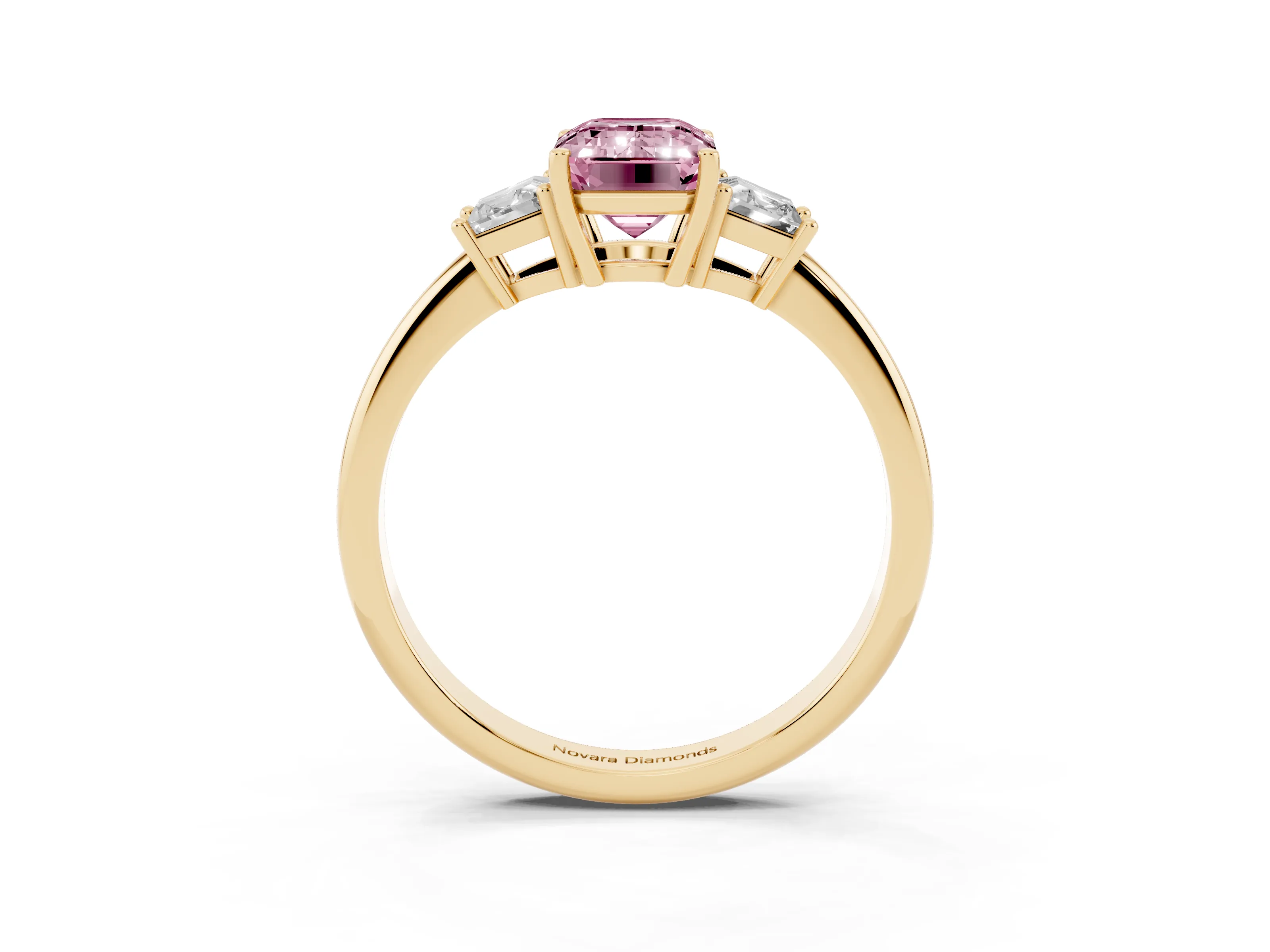 Fancy Pink Emerald Cut Diamond Three-Stone Ring Set in Yellow gold with Trapezoid Side Stones and Prong Setting