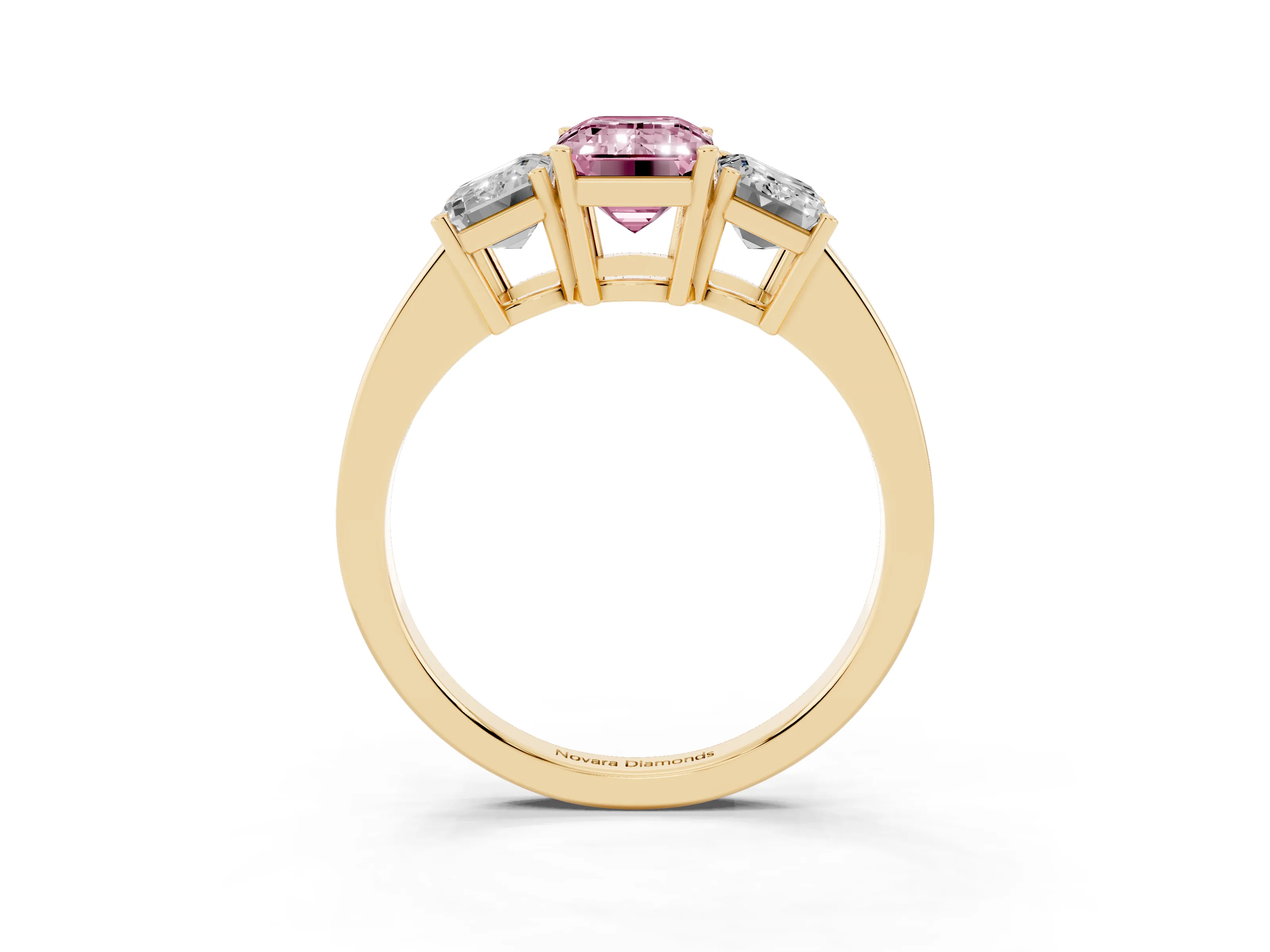 Fancy Pink Emerald Cut Diamond Three-Stone Engagement Ring Set in Yellow gold with Flat Band