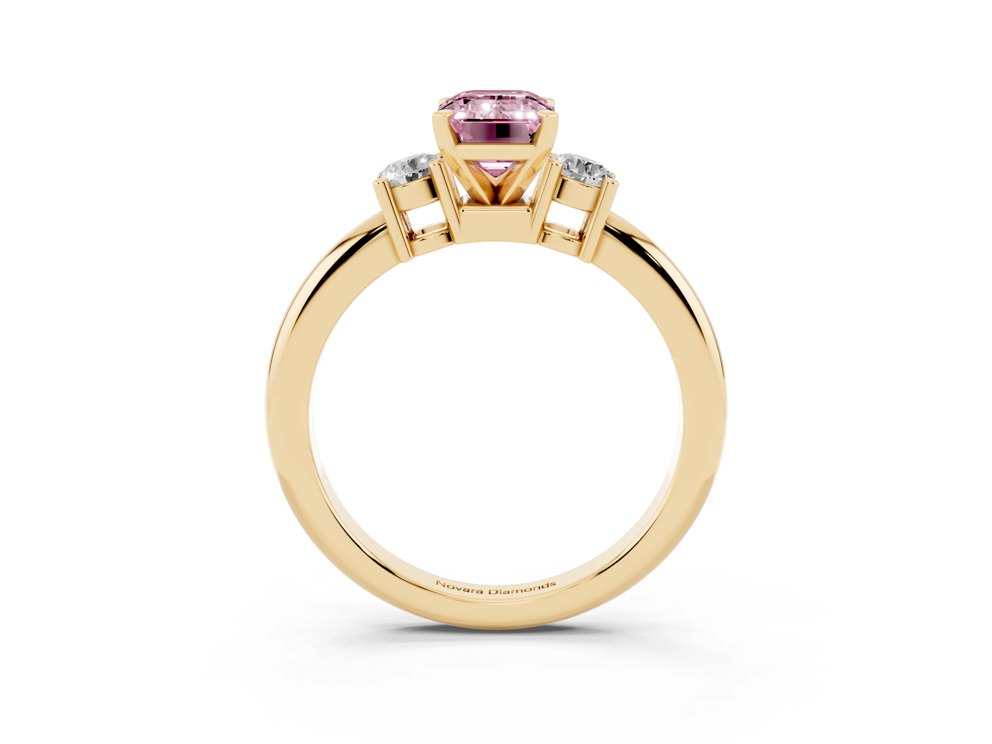 Fancy Pink Three-Stone Emerald Cut Diamond Ring Set in Yellow gold with Prong Setting and Plain Band