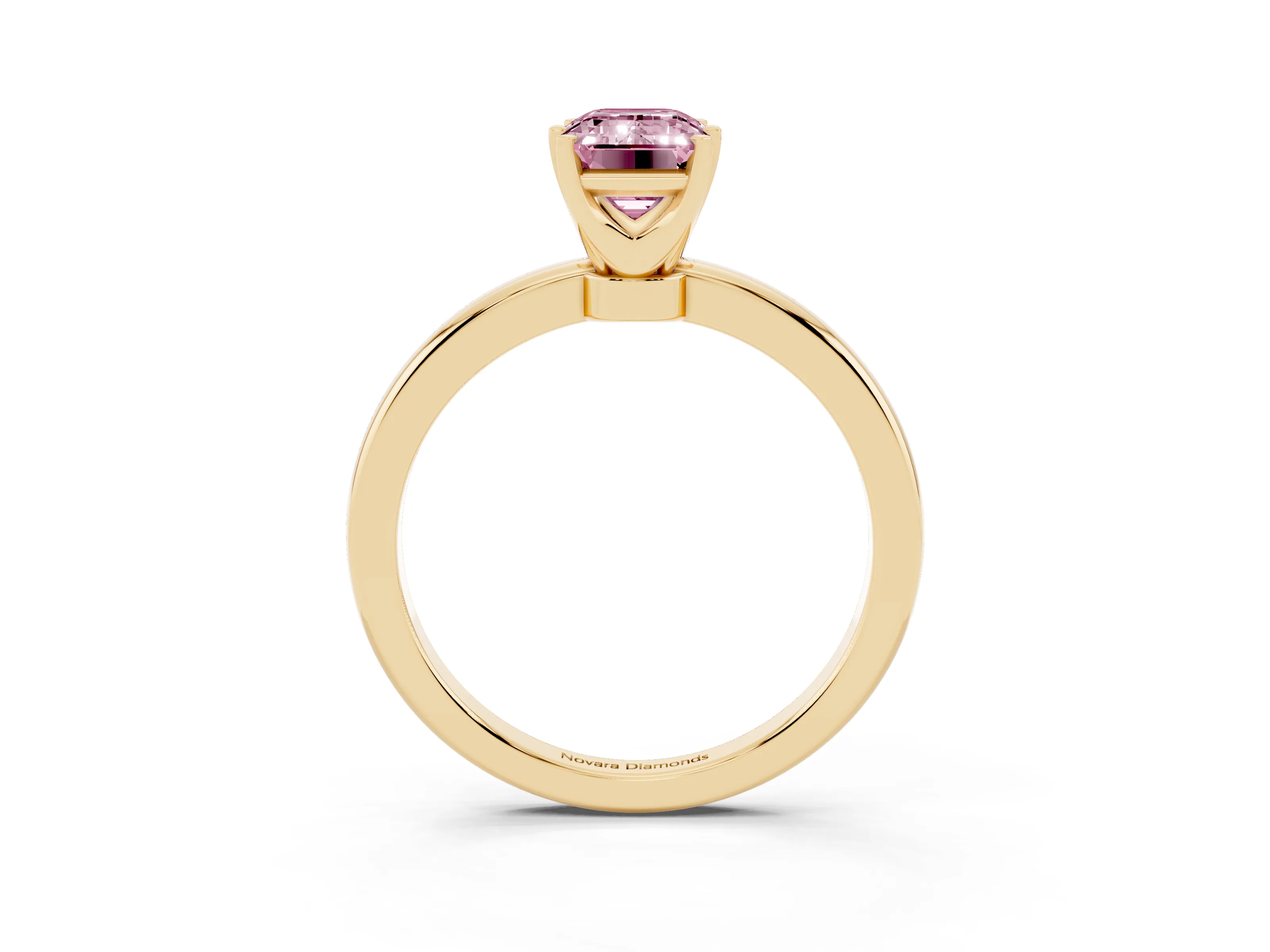 Fancy Pink Emerald Cut Diamond Solitaire Ring Set in Yellow gold with Raised Prong Setting on a Classic Band