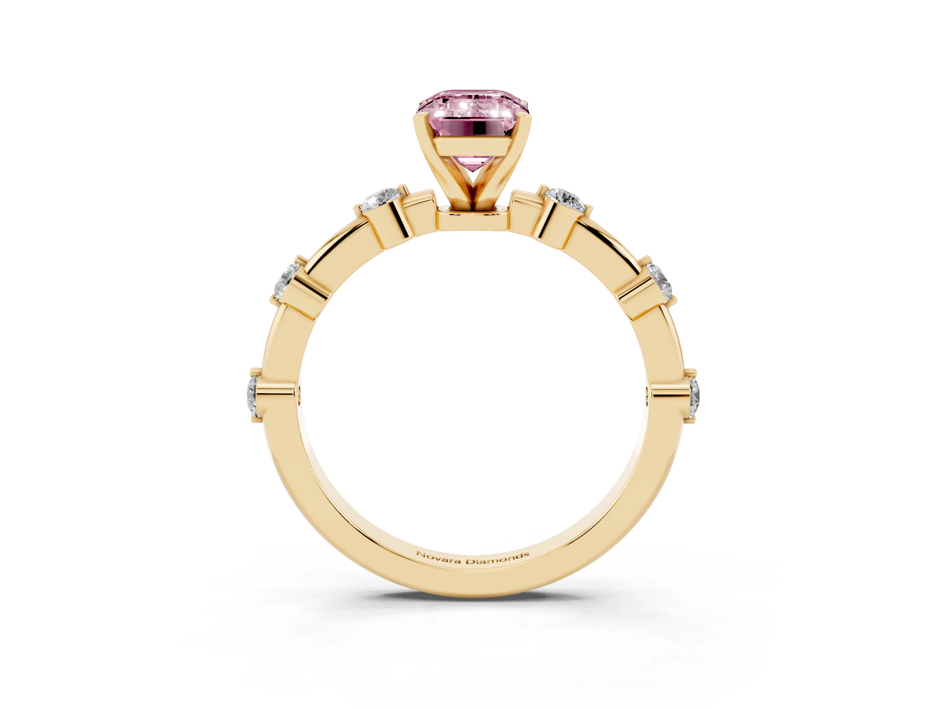 Fancy Pink Emerald Cut Diamond Solitaire Ring Set in Yellow gold with Bezel Set Side Stones and Prong Setting