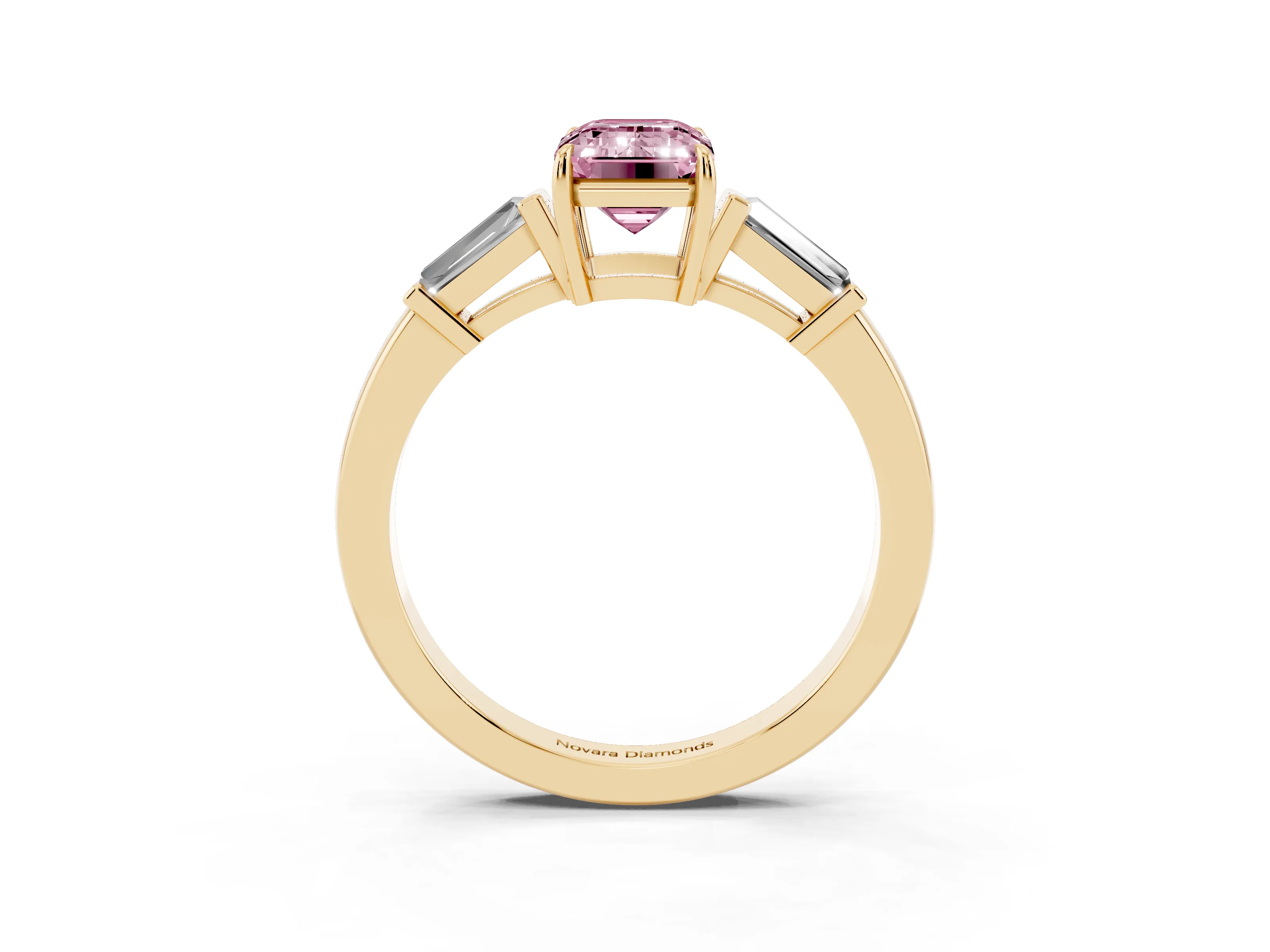 Fancy Pink Emerald Cut Diamond Three-Stone Ring Set in Yellow gold with Tapered Baguette Side Stones and Prong Setting