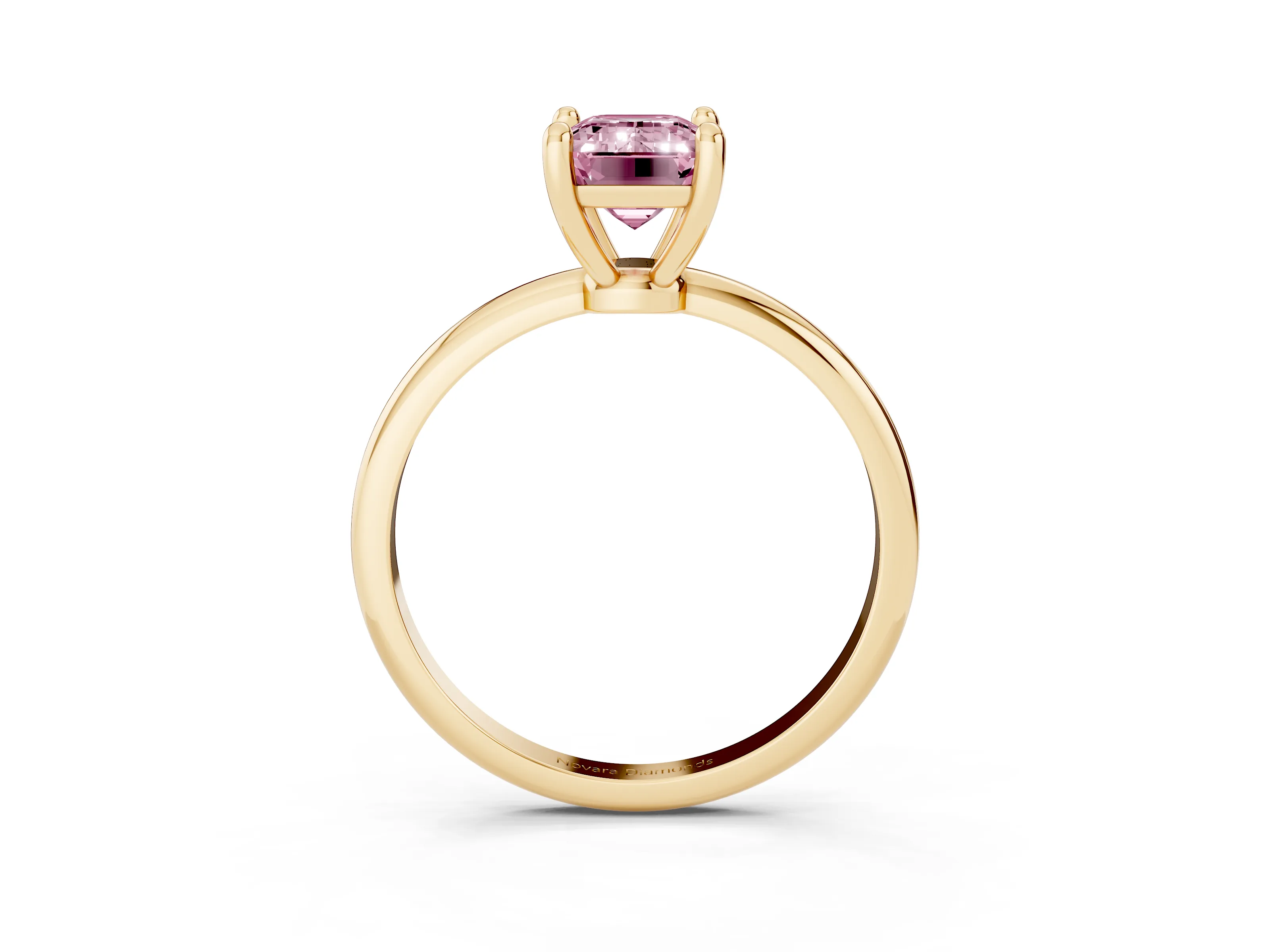 Fancy Pink Emerald Cut Diamond Solitaire Ring Set in Yellow gold with Secure Prong Setting on a Classic Band