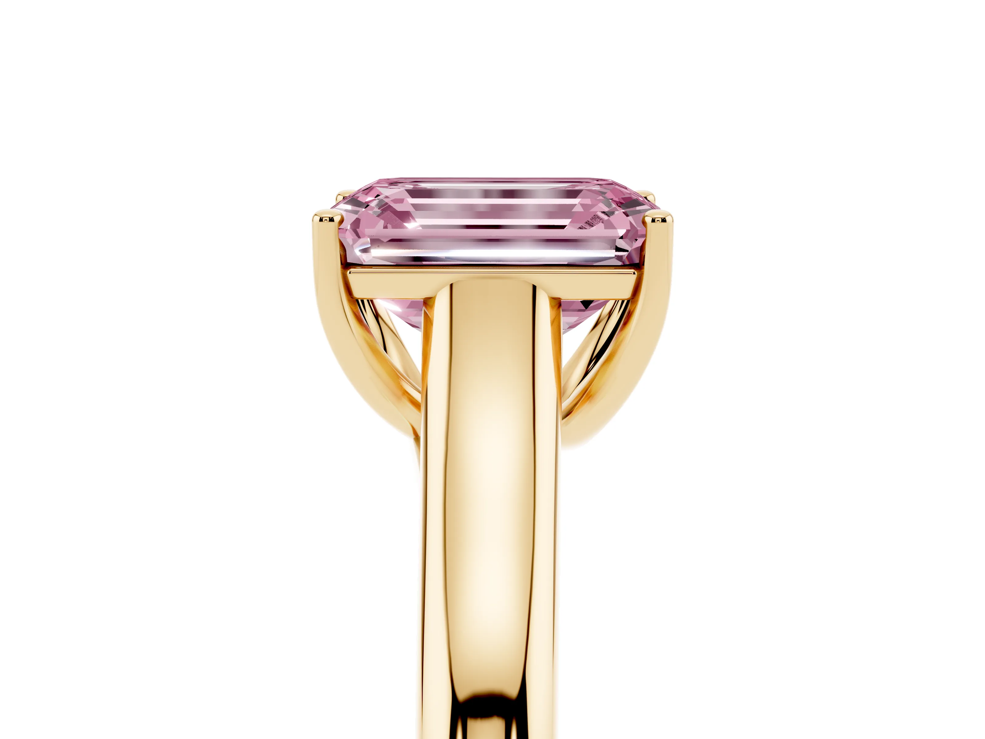Fancy Pink Emerald Cut Diamond Solitaire Engagement Ring Set in Yellow gold with Subtly Tapered Band and Prong Setting