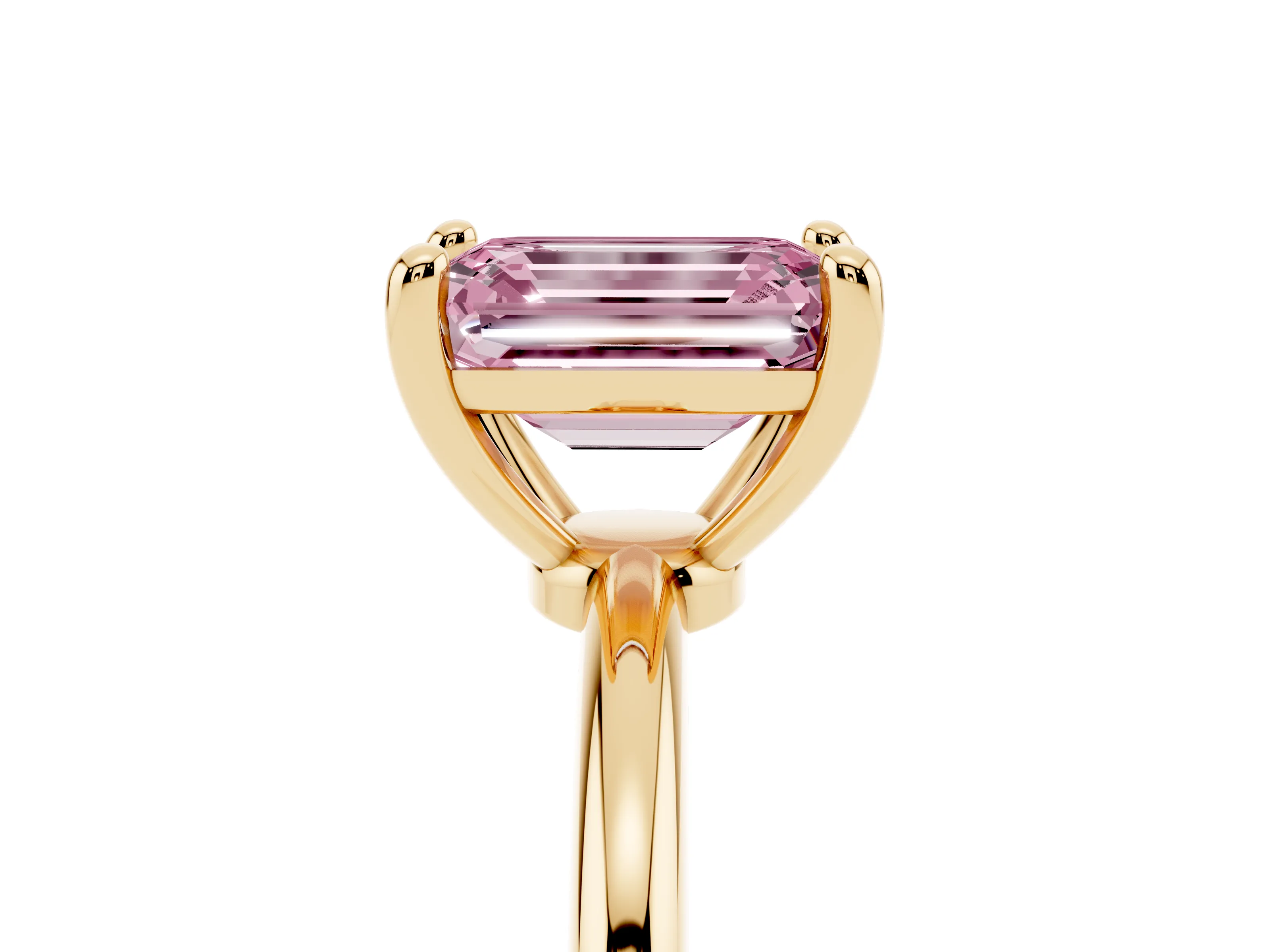 Fancy Pink Emerald Cut Diamond Solitaire Ring Set in Yellow gold with Secure Prong Setting on a Classic Band