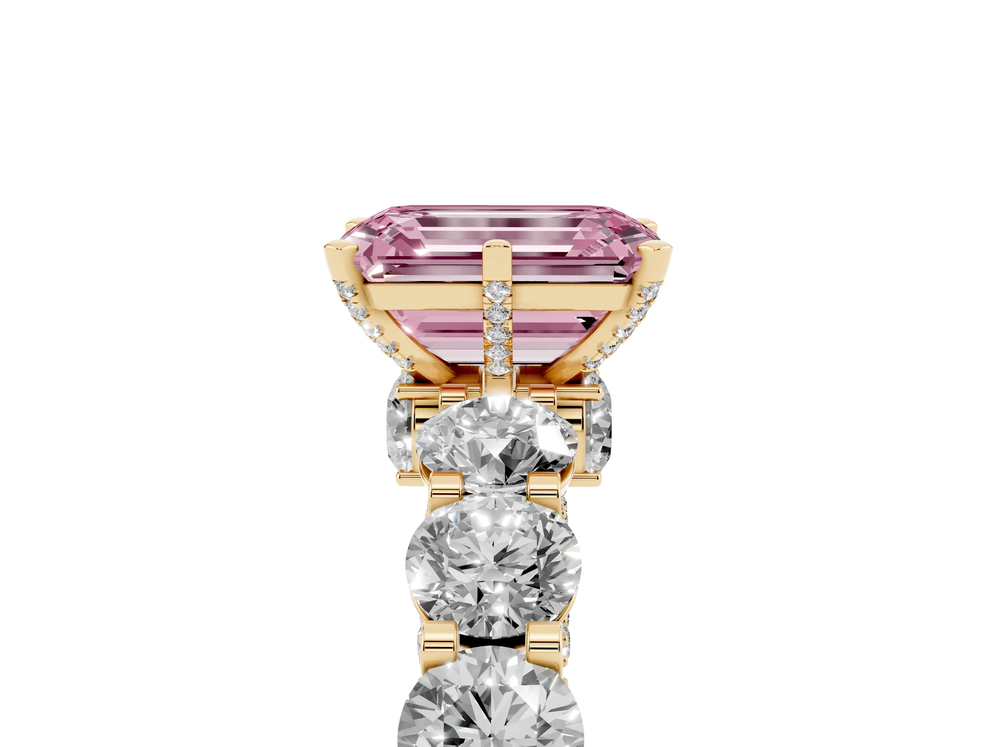 Fancy Pink Emerald Cut Diamond Side Stone Ring Set in Yellow gold with Alternating Round and Oval Side Stones