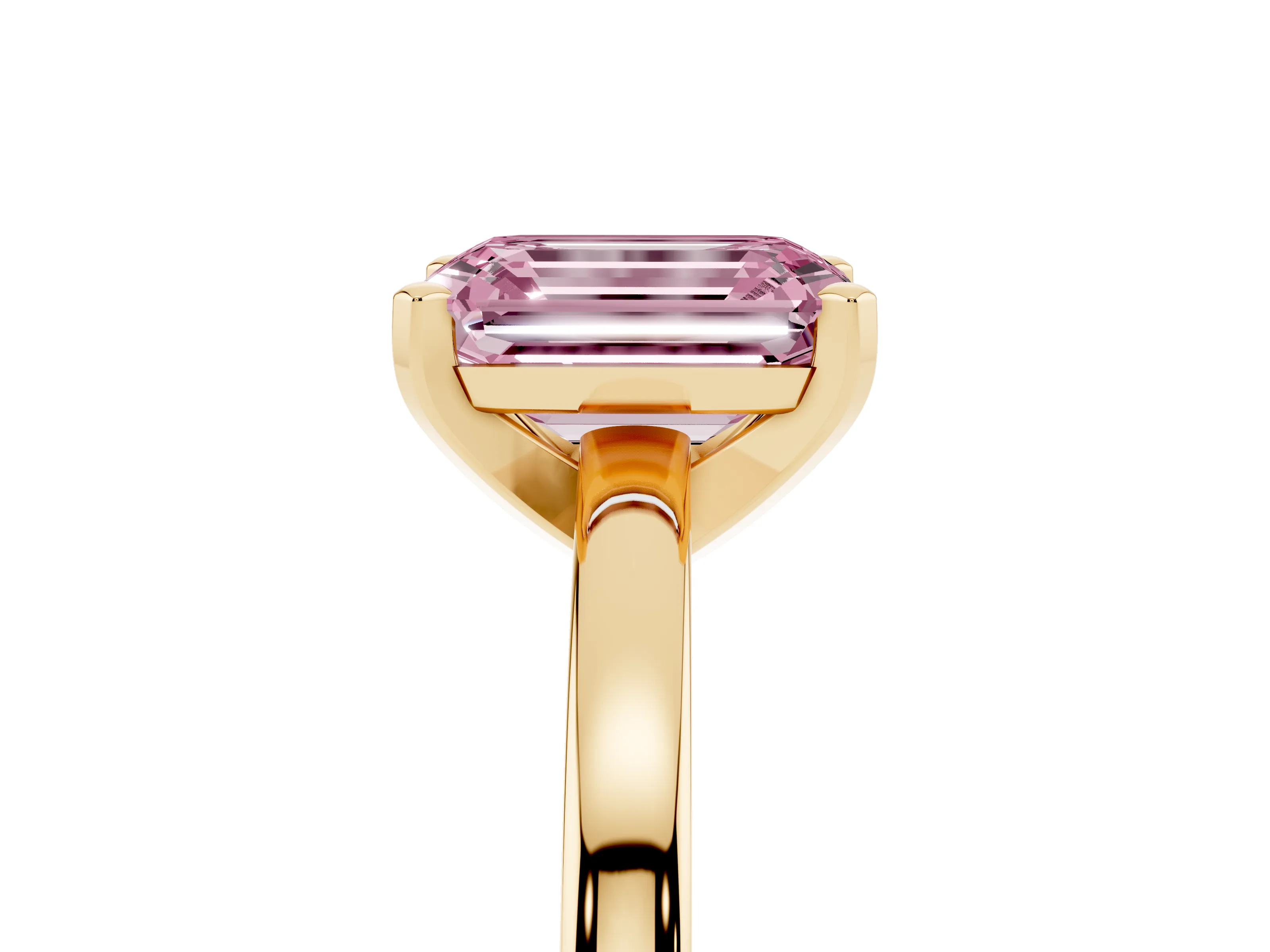 Fancy Pink Emerald Cut Diamond Solitaire Engagement Ring Set in Yellow gold with Prong Setting on a Classic Band