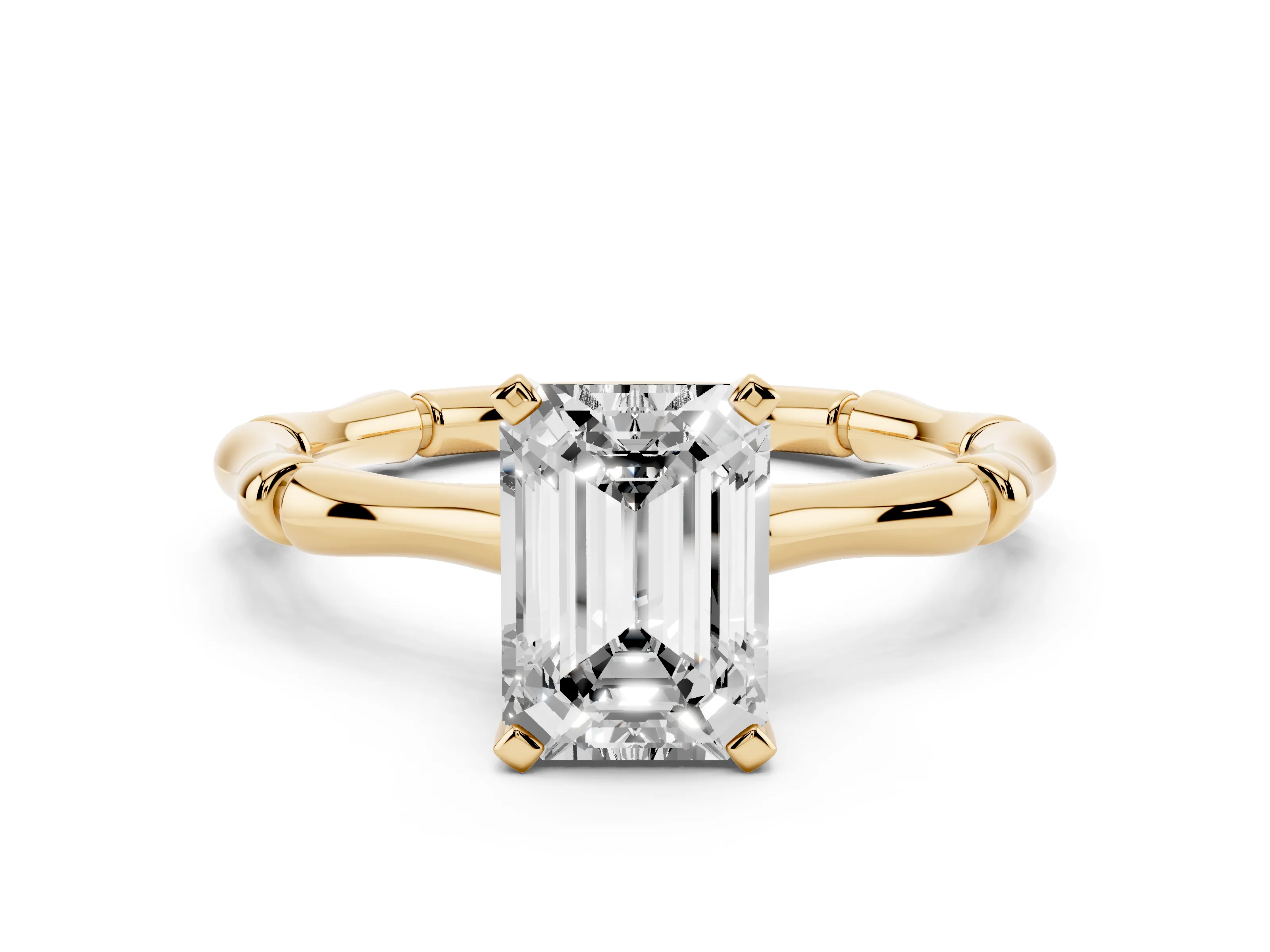 Emerald Cut Diamond Solitaire Ring Set in Yellow gold with Bamboo Band and Prong Setting