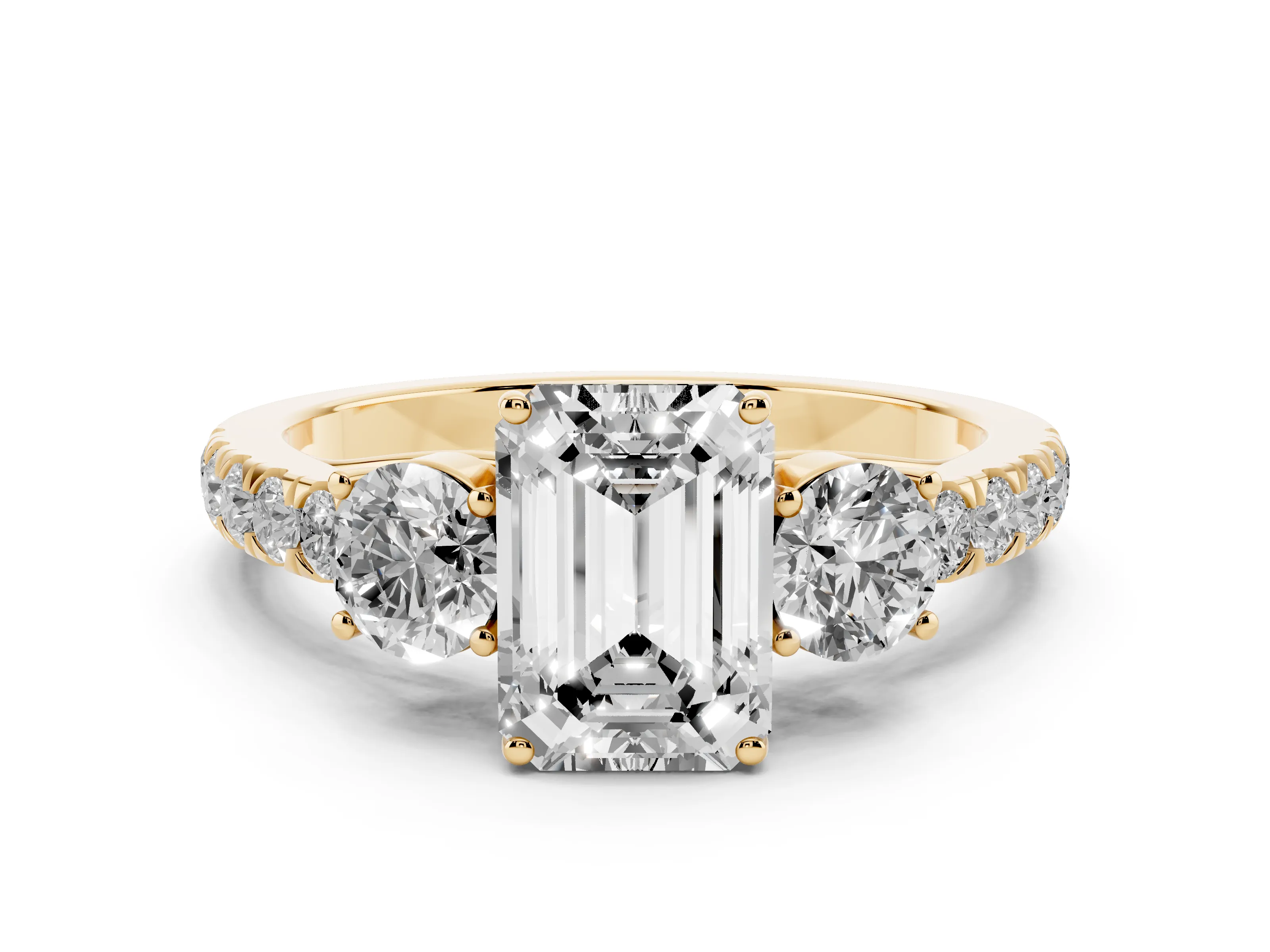 Emerald Cut Diamond Three-Stone Ring Set in Yellow gold with Round Side Stones and Delicate Pavé Band