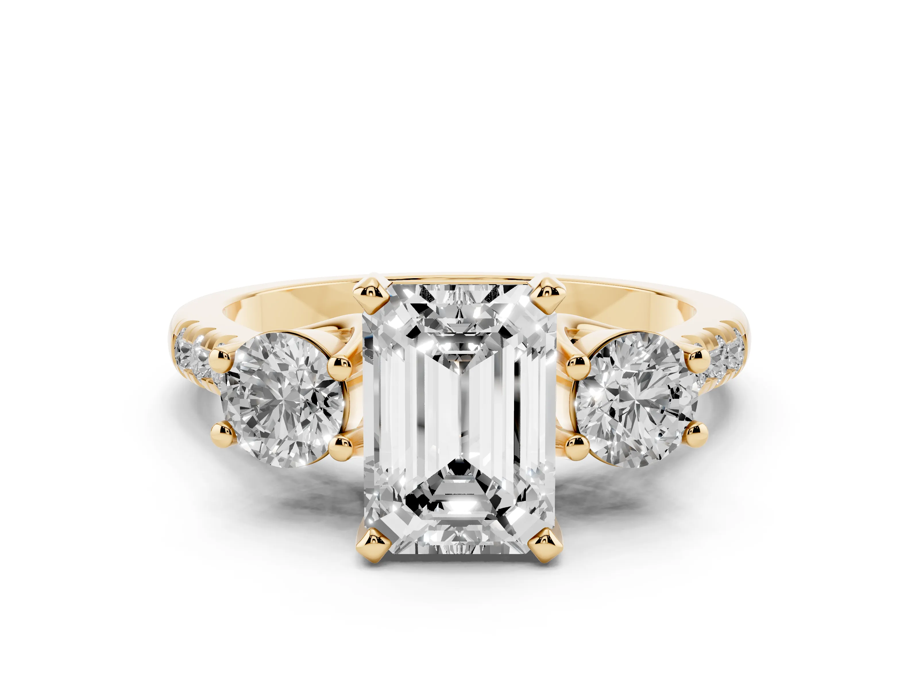 Three-Stone Emerald Cut Diamond Pavé Band Ring Set in Yellow gold with Prong-Set Trio