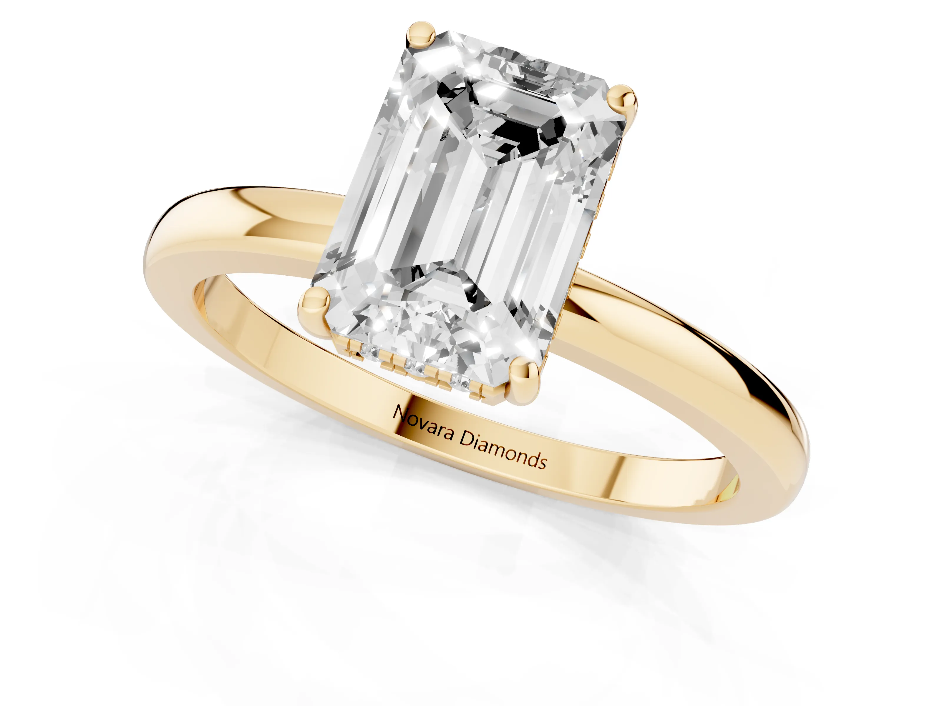 Emerald Cut Diamond Solitaire Ring Set in Yellow gold with Plain Band and Prong Setting