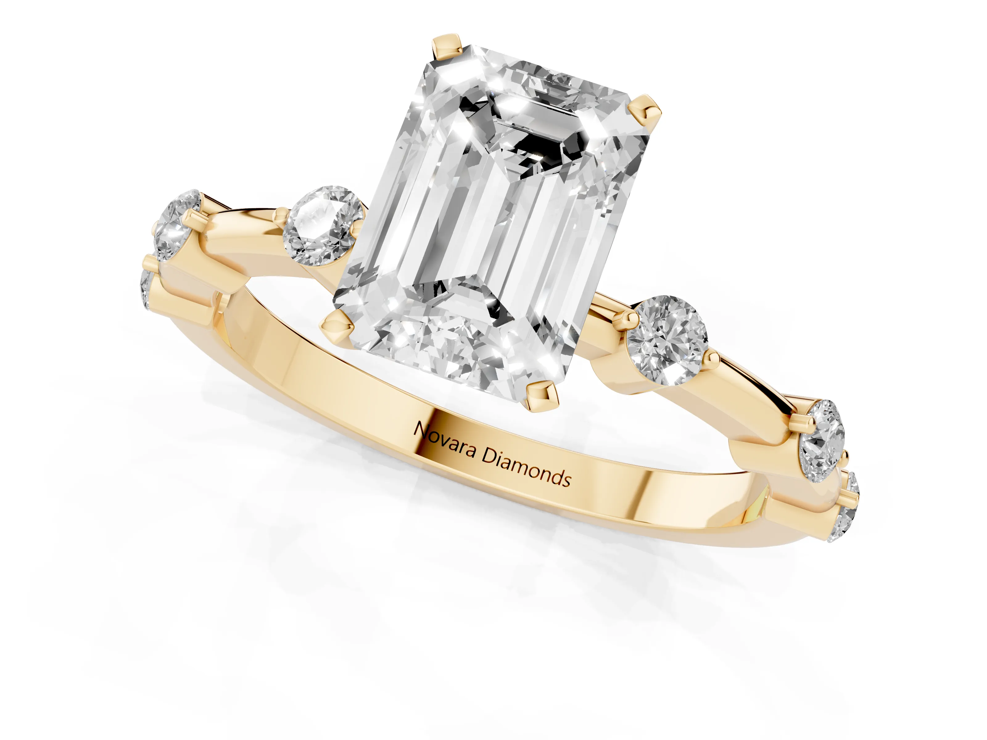 Emerald Cut Diamond Solitaire Ring Set in Yellow gold with Bezel Set Side Stones and Prong Setting