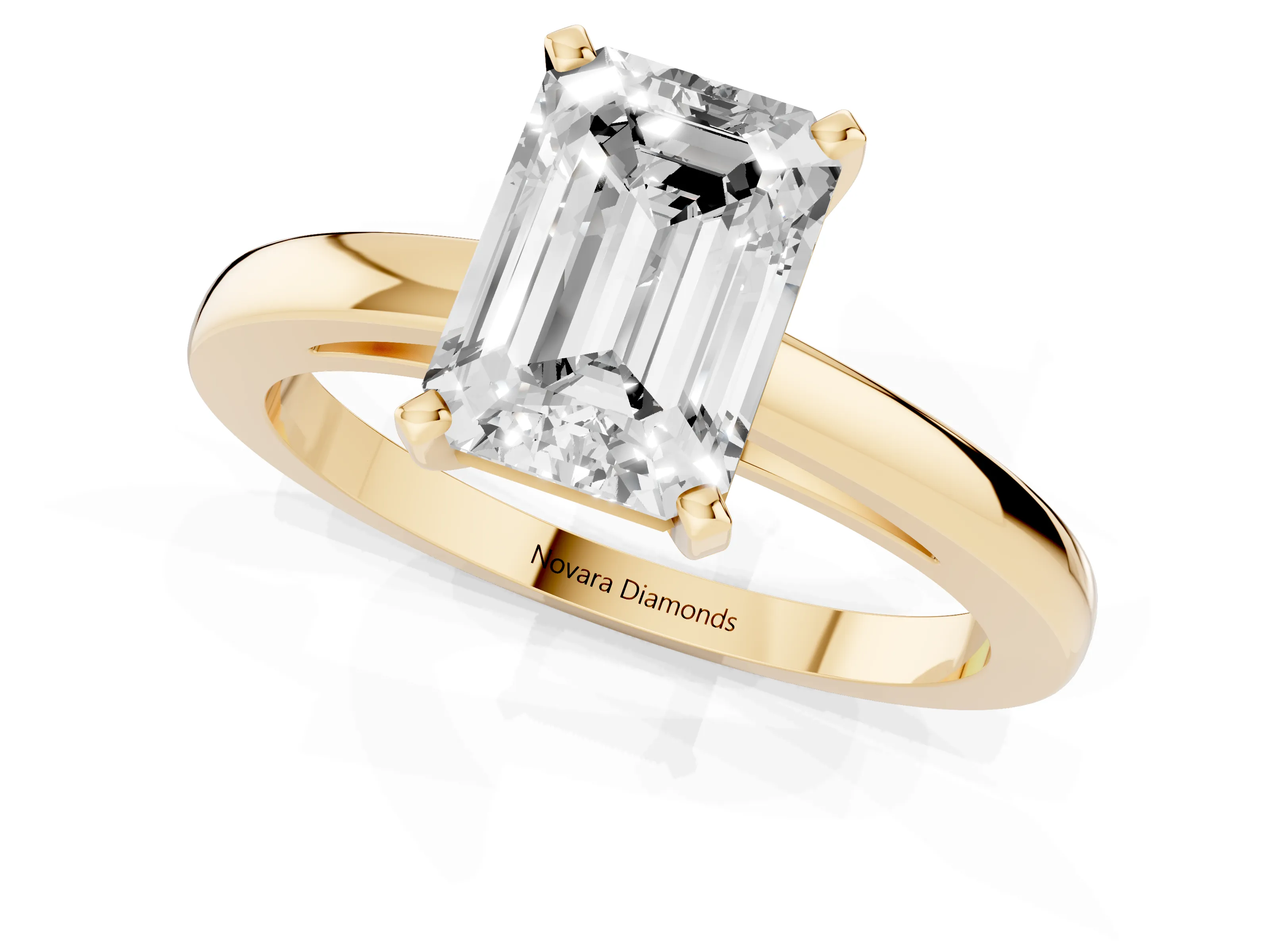 Emerald Cut Diamond Solitaire Engagement Ring Set in Yellow gold with Prong Setting on a Classic Band