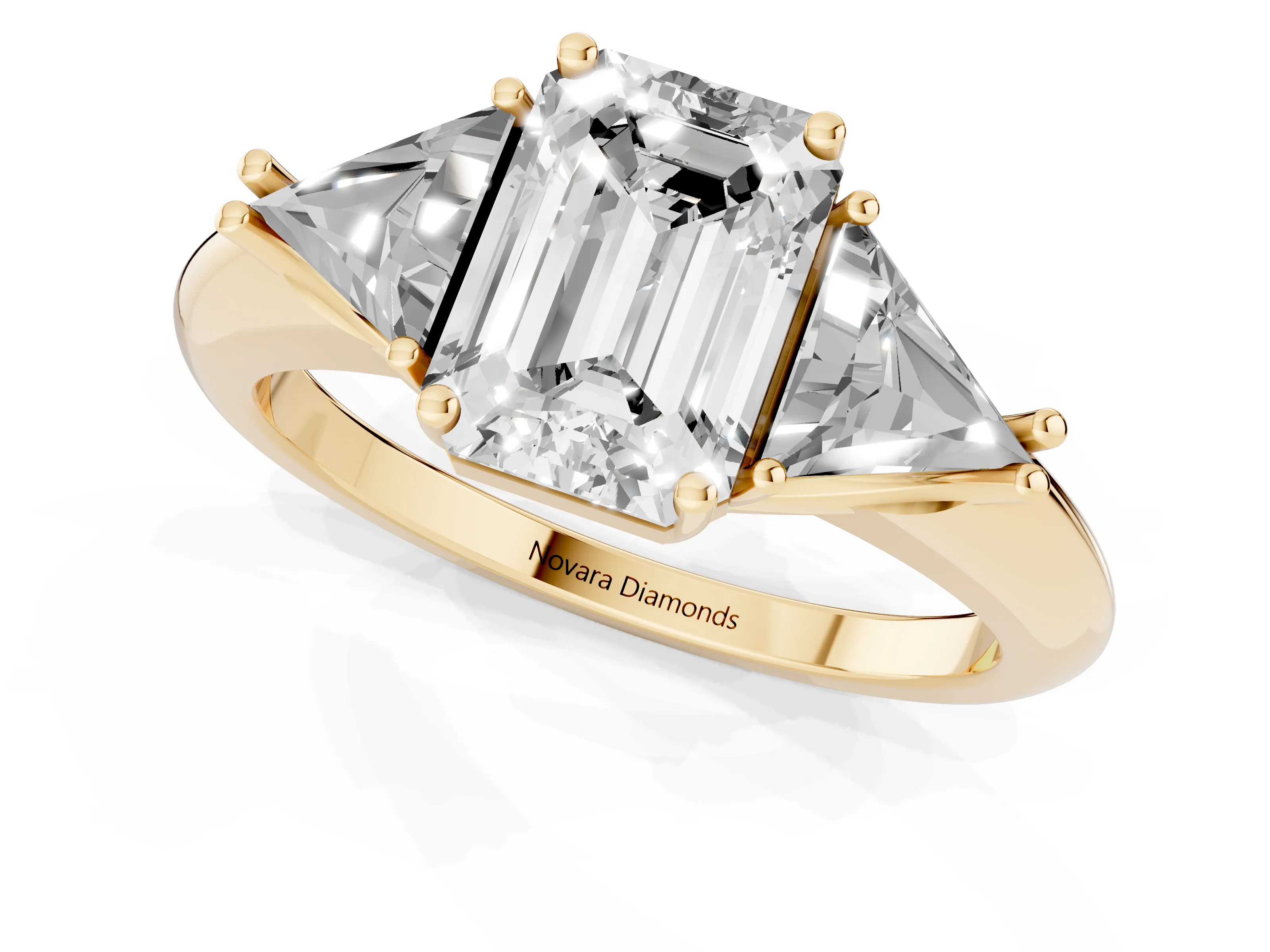 Emerald Cut Diamond Three-Stone Engagement Ring Set in Yellow gold with Trillion Side Stones
