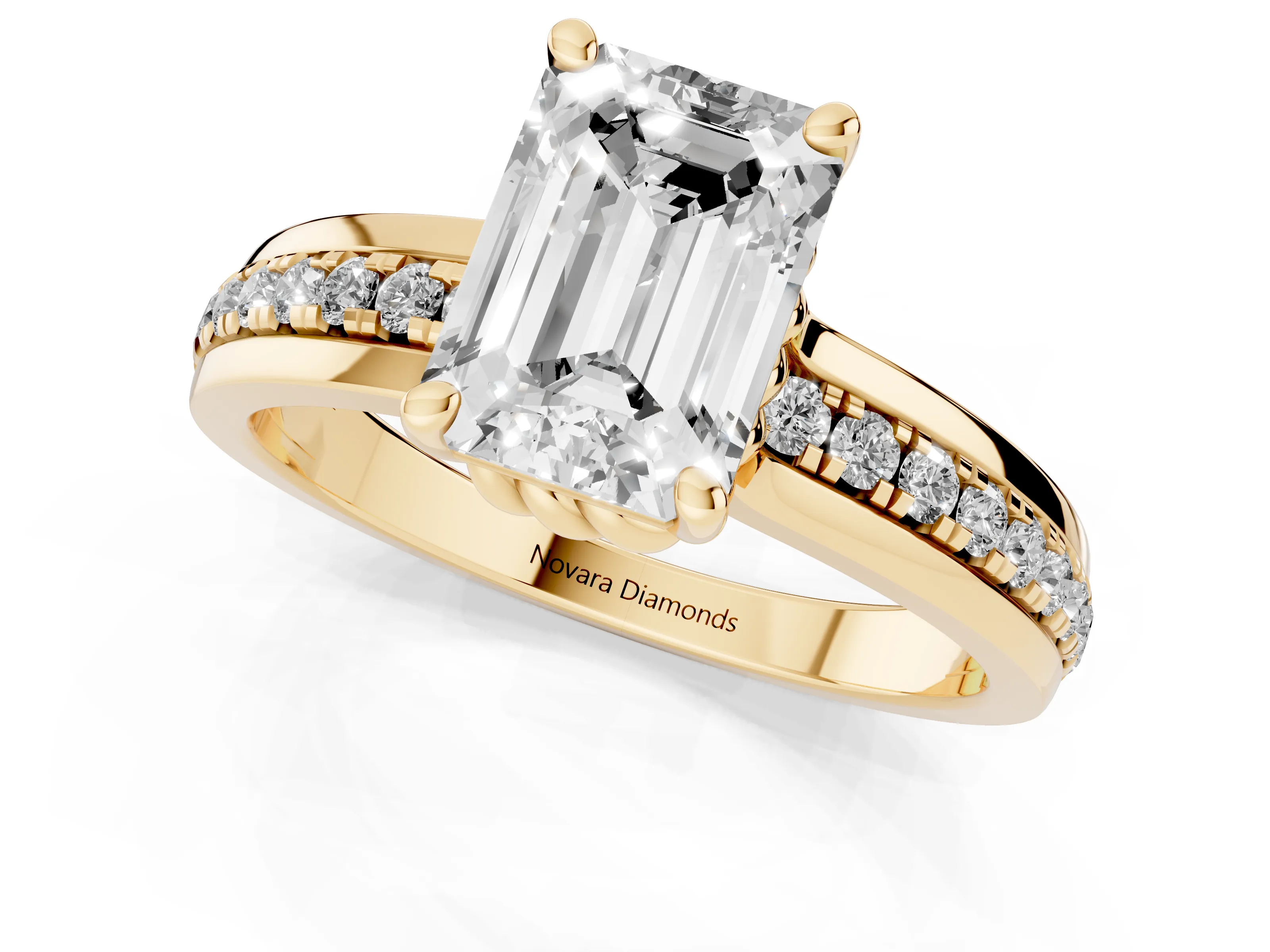 Emerald Cut Diamond Solitaire Ring Set in Yellow gold with Channel Set Band and Prong Setting