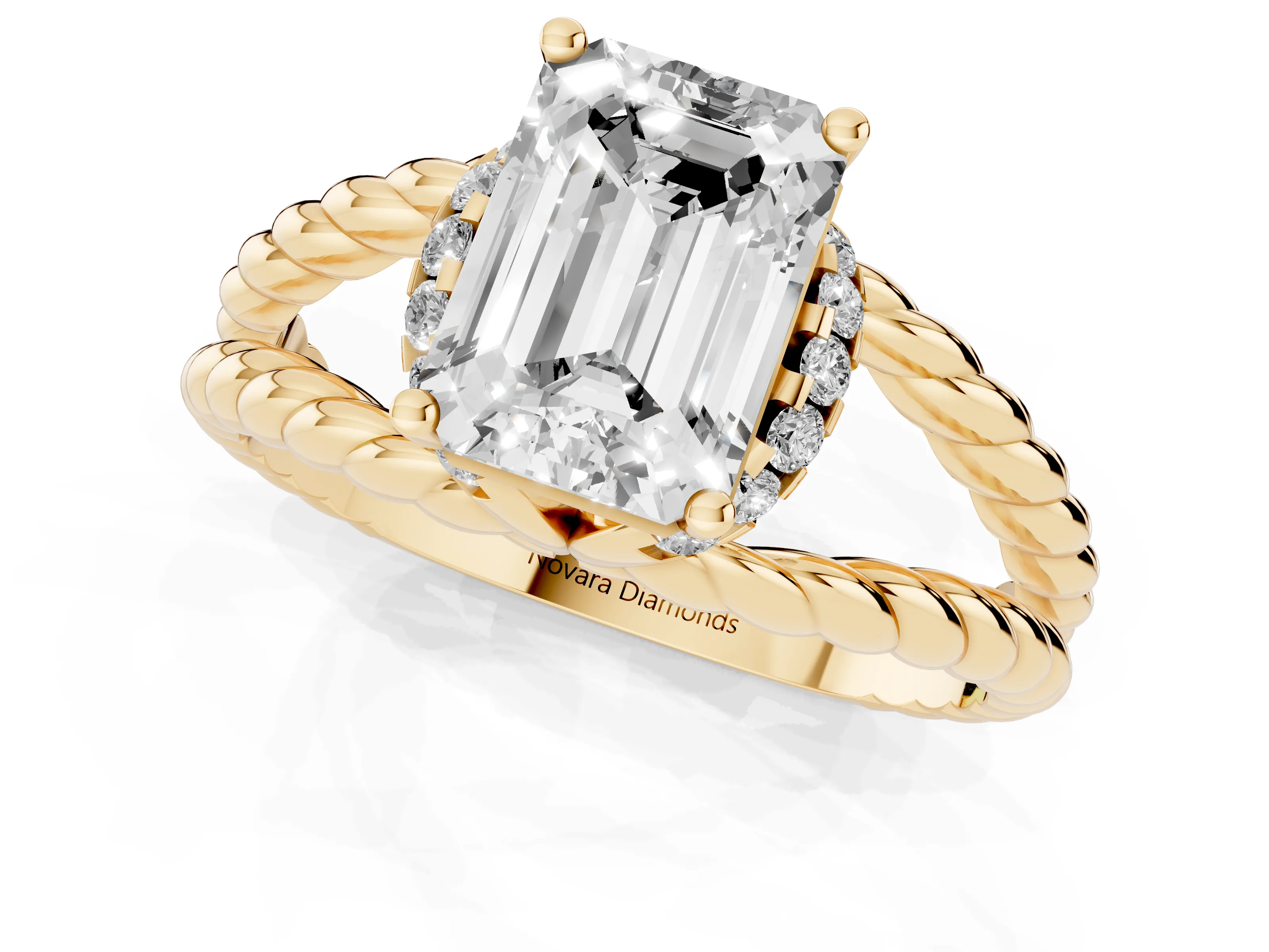 Emerald Cut Diamond Halo Ring Set in Yellow gold with Twisted Band and Prong Setting