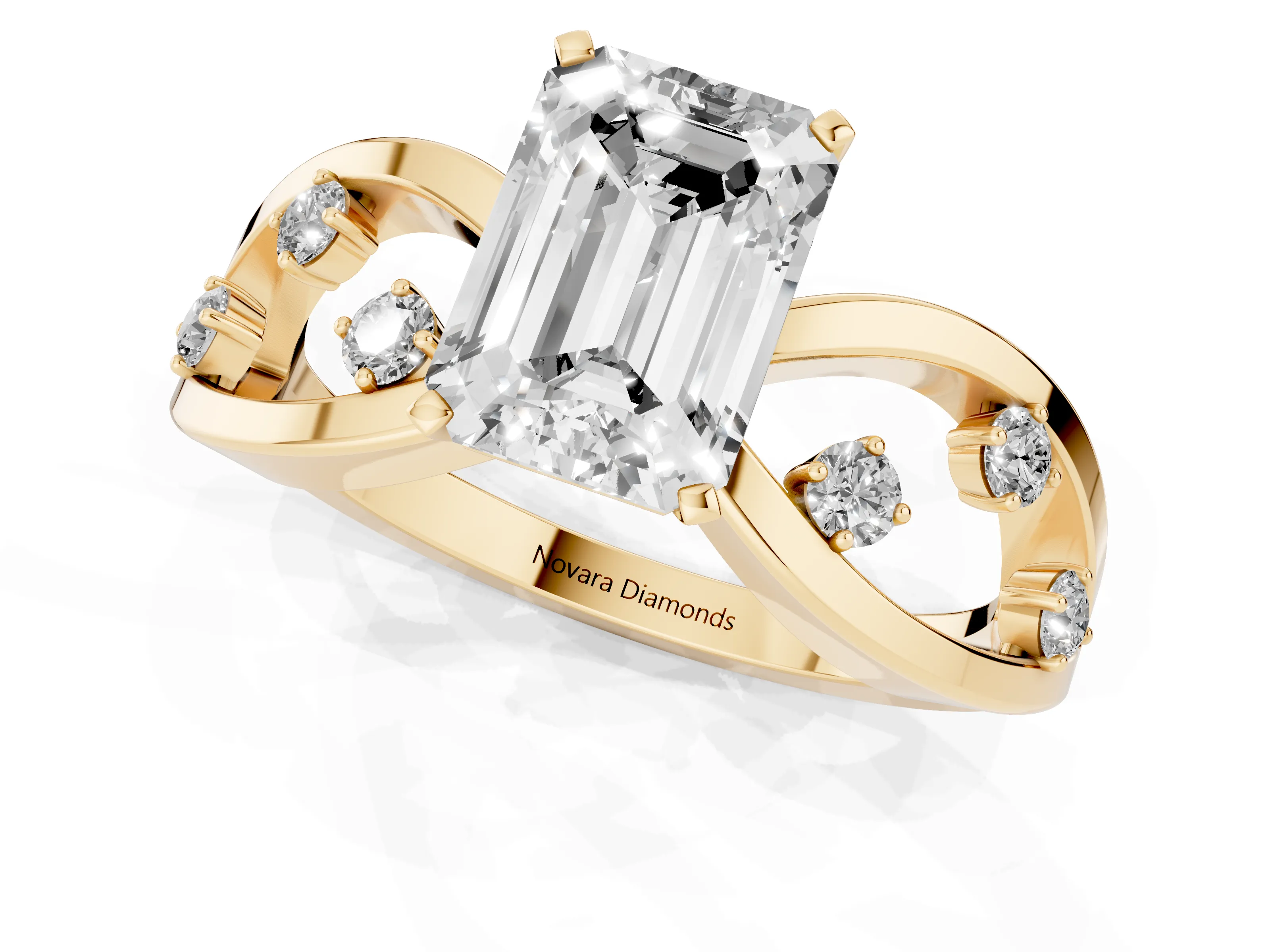 Emerald Cut Diamond Solitaire Ring Set in Yellow gold with Side Stones on Criss-Cross Band and Prong Setting