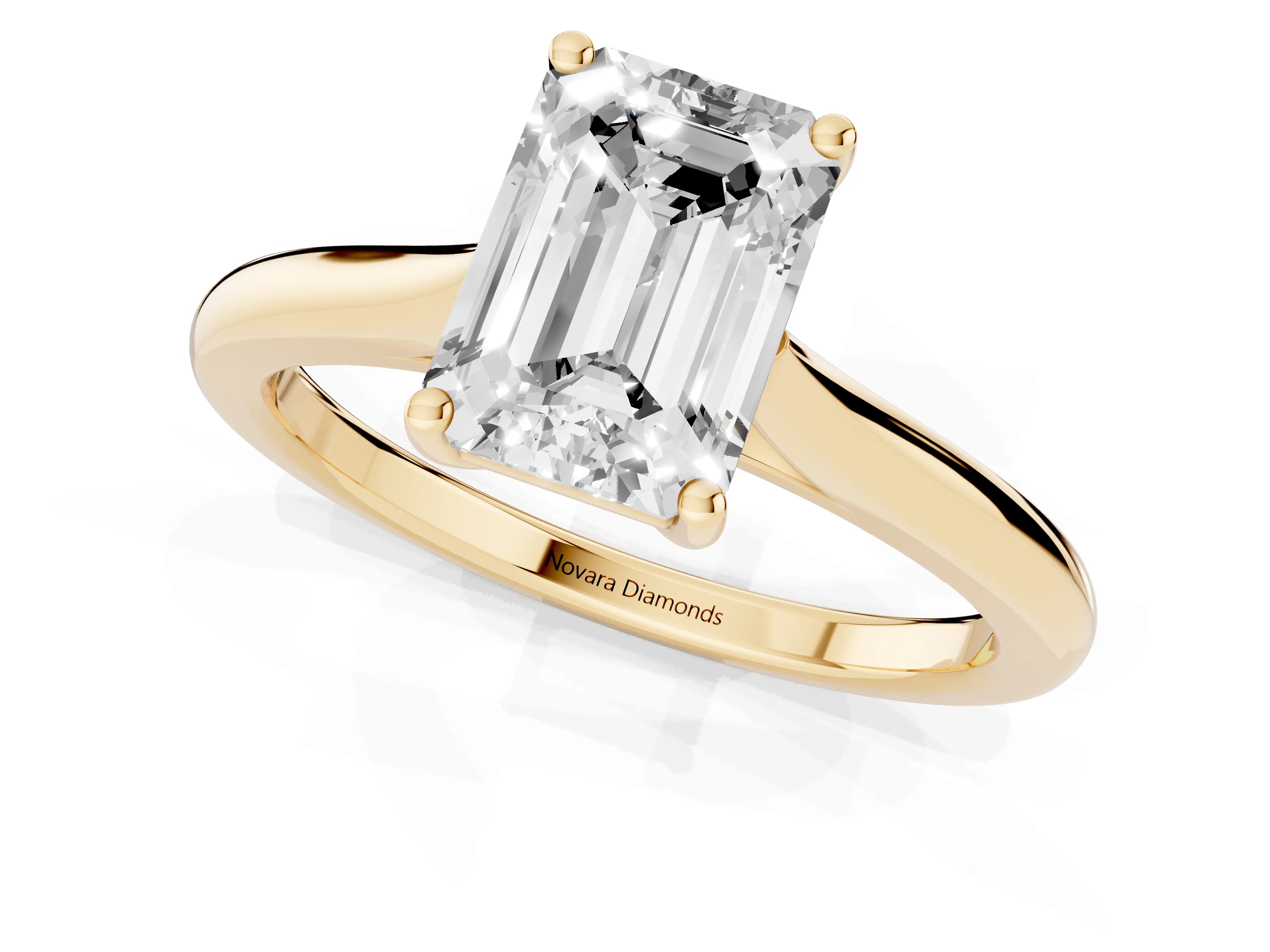 Emerald Cut Diamond Solitaire Ring Set in Yellow gold with Cathedral Band and Prong Setting