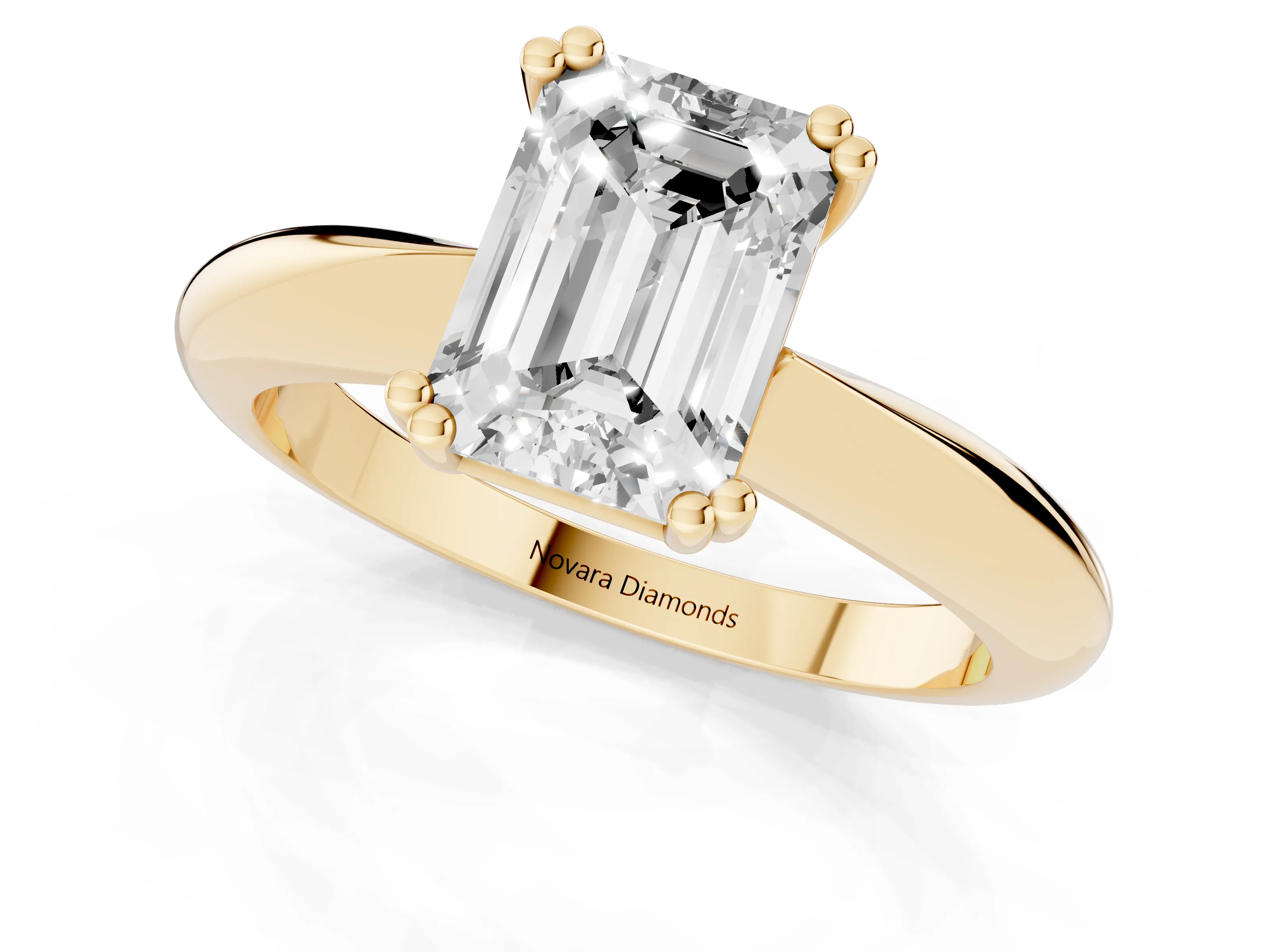 Emerald Cut Diamond Solitaire Engagement Ring Set in Yellow gold with Tapered Band and Prong Setting