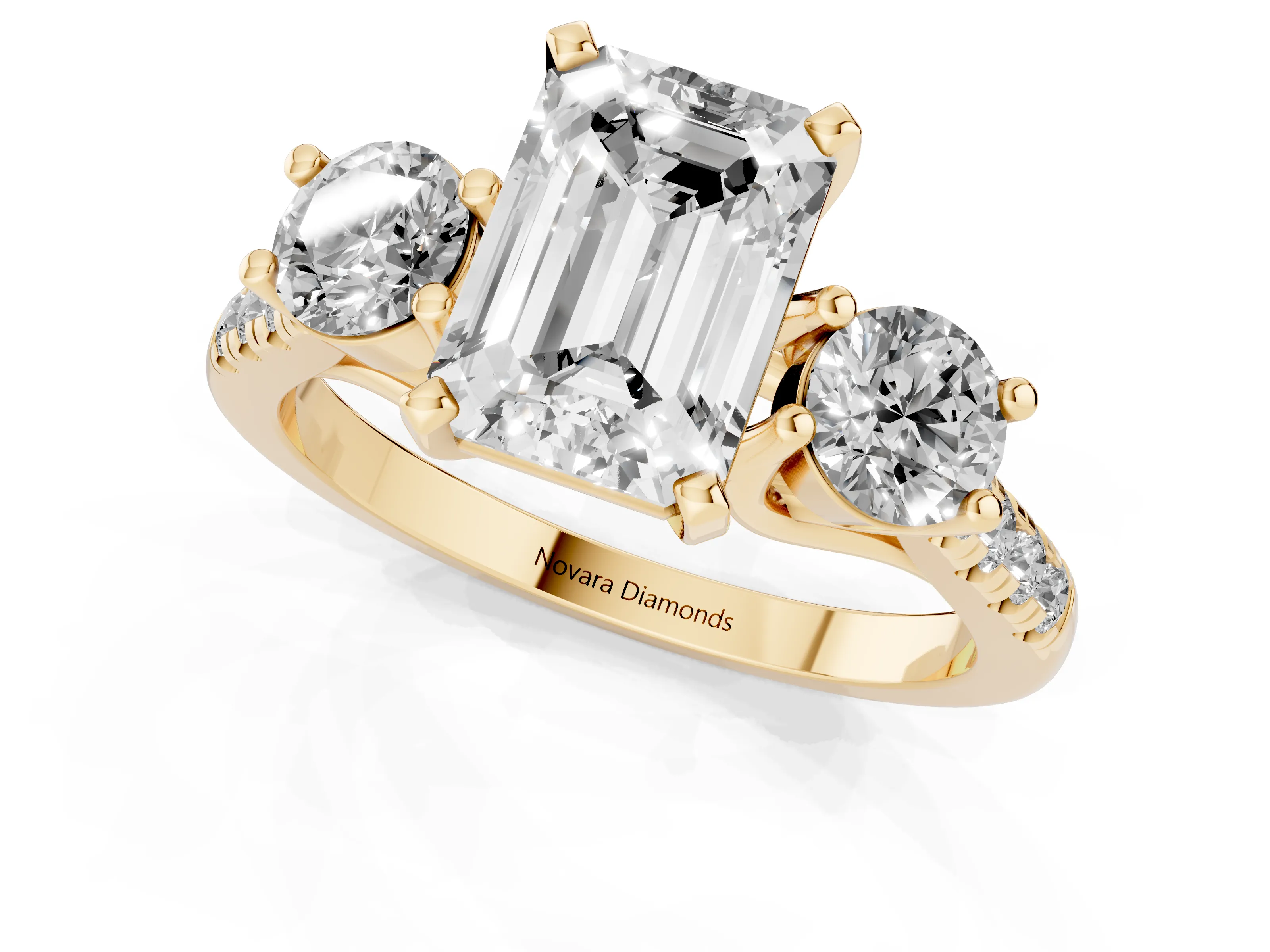 Three-Stone Emerald Cut Diamond Pavé Band Ring Set in Yellow gold with Prong-Set Trio