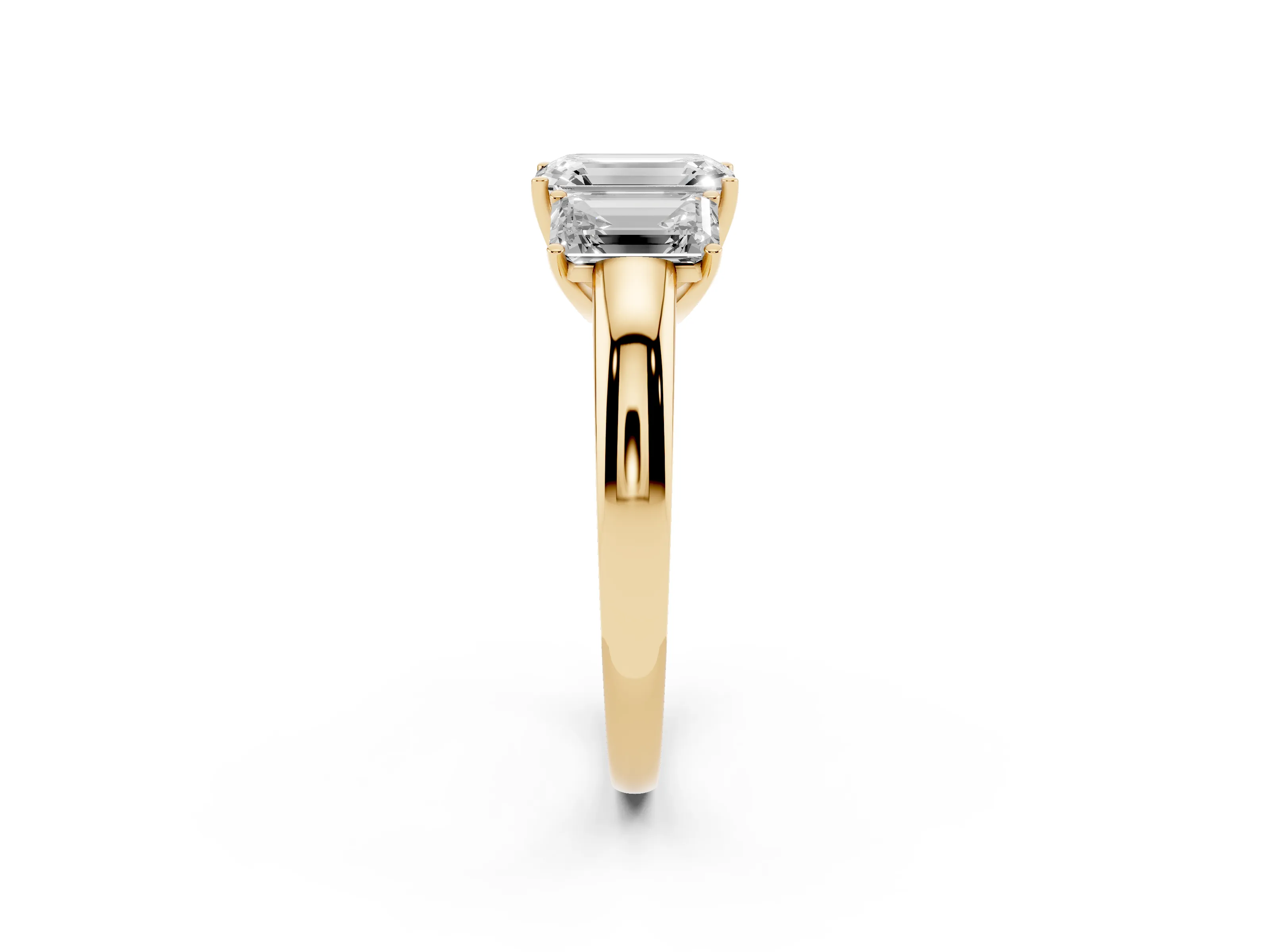 Emerald Cut Diamond Three-Stone Ring Set in Yellow gold with Bold Center and Classic Band