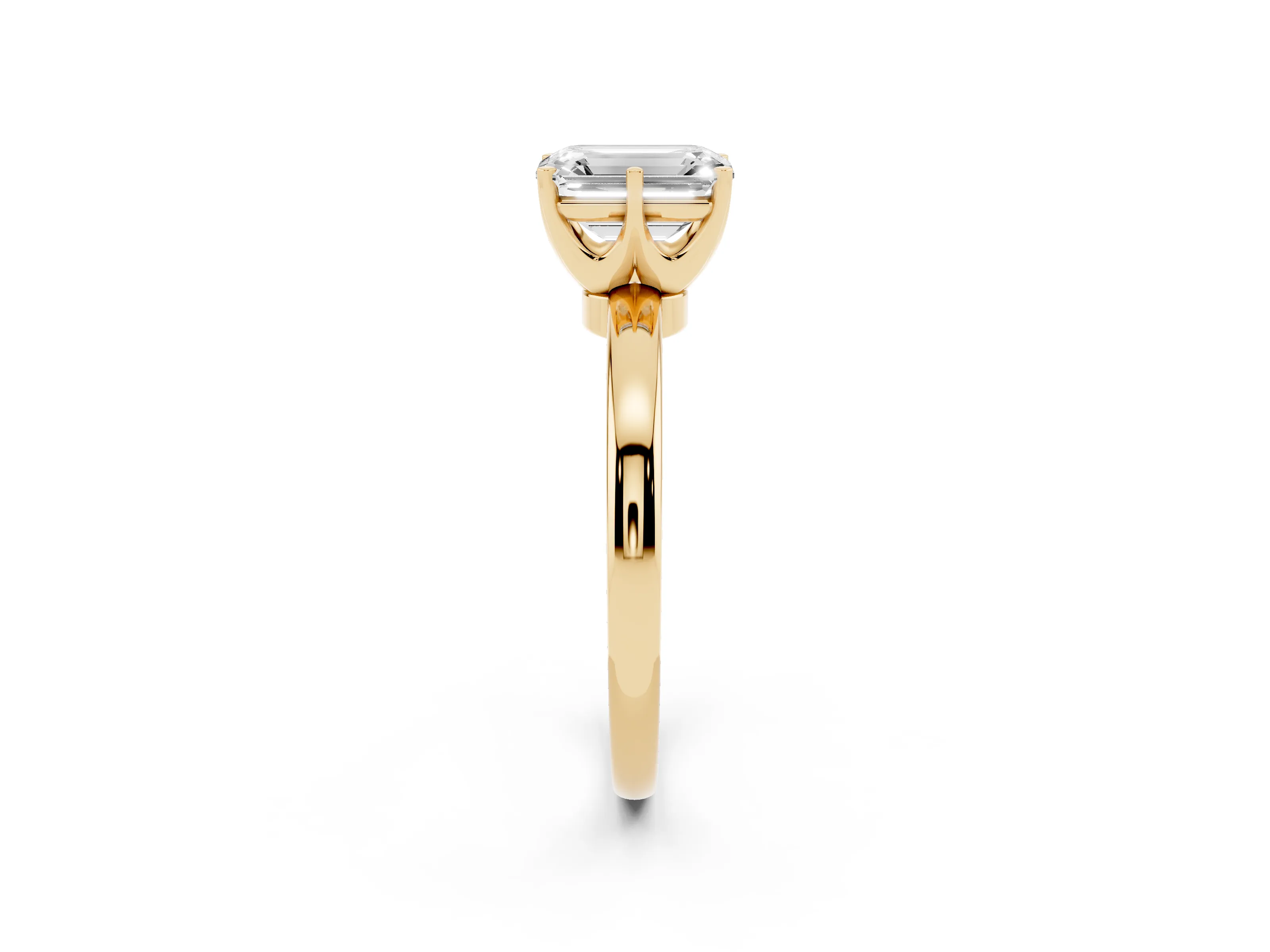 Emerald Cut Diamond Solitaire Ring Set in Yellow gold with Raised Prong Setting on a Classic Band