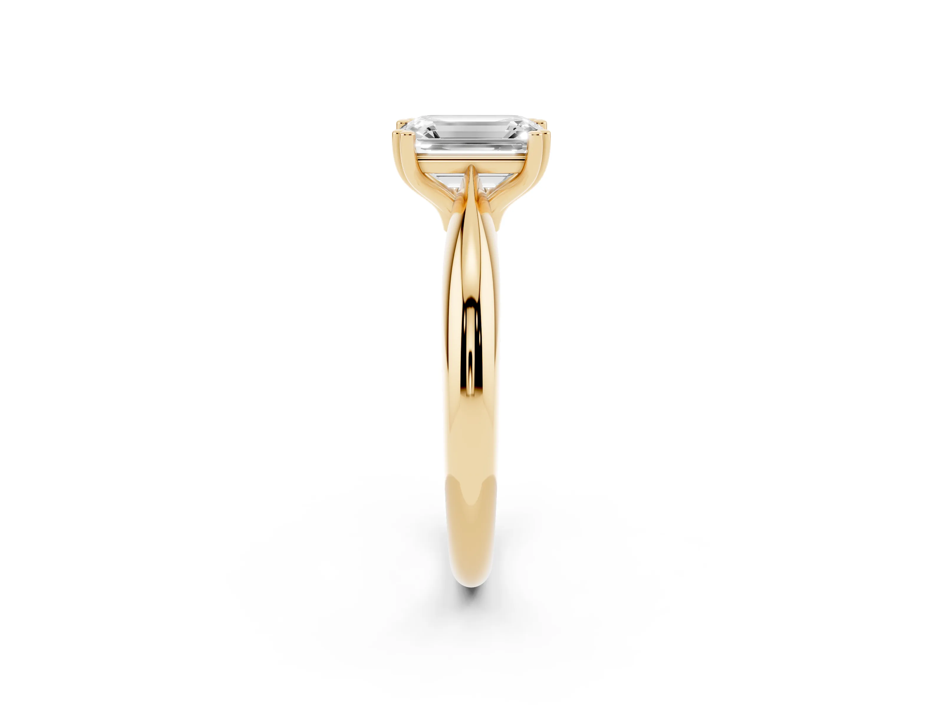 Emerald Cut Diamond Solitaire Engagement Ring Set in Yellow gold with Tapered Band and Prong Setting