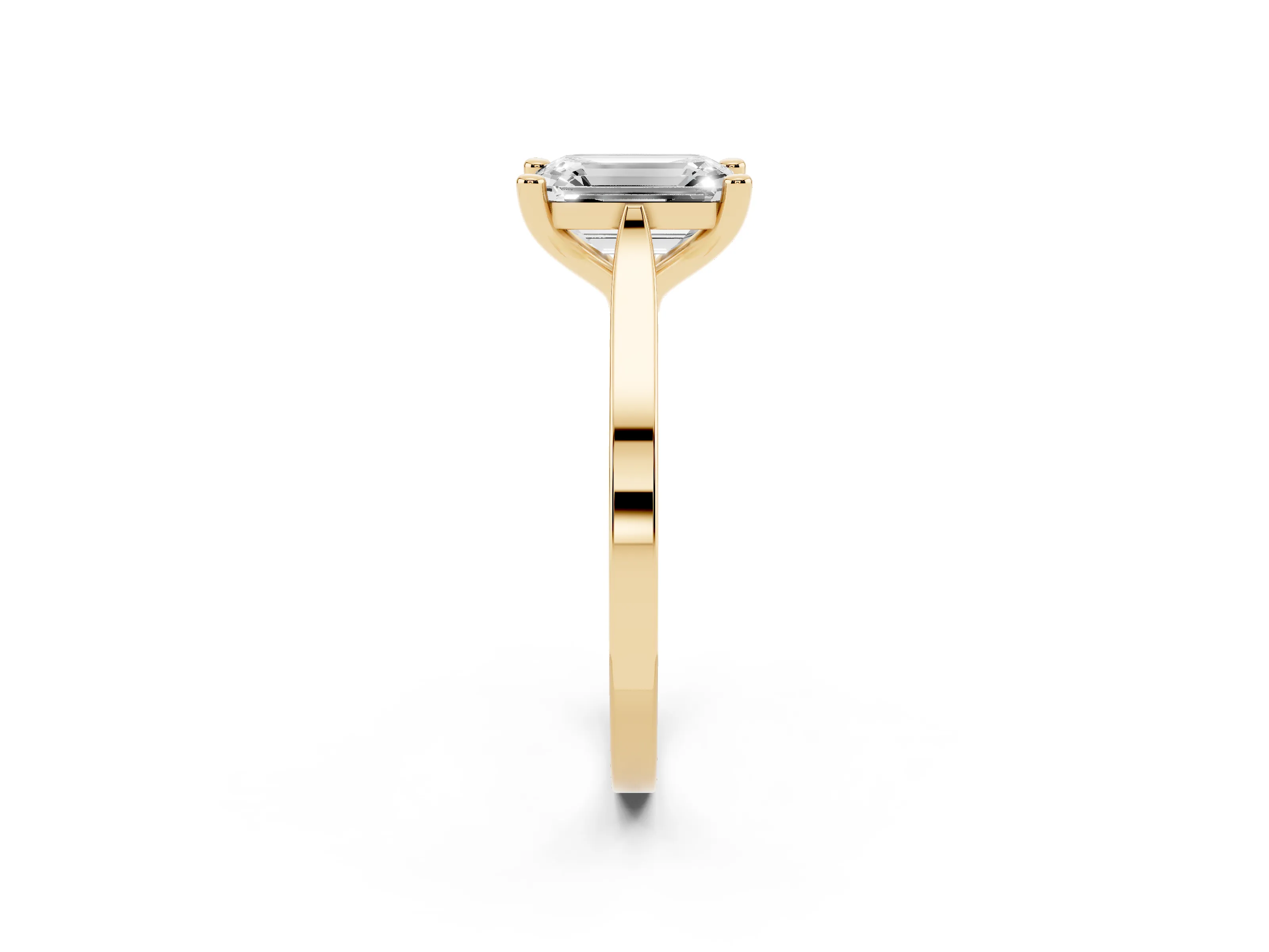 Emerald Cut Diamond Solitaire Ring Set in Yellow gold with Prong Setting and Tapered Band