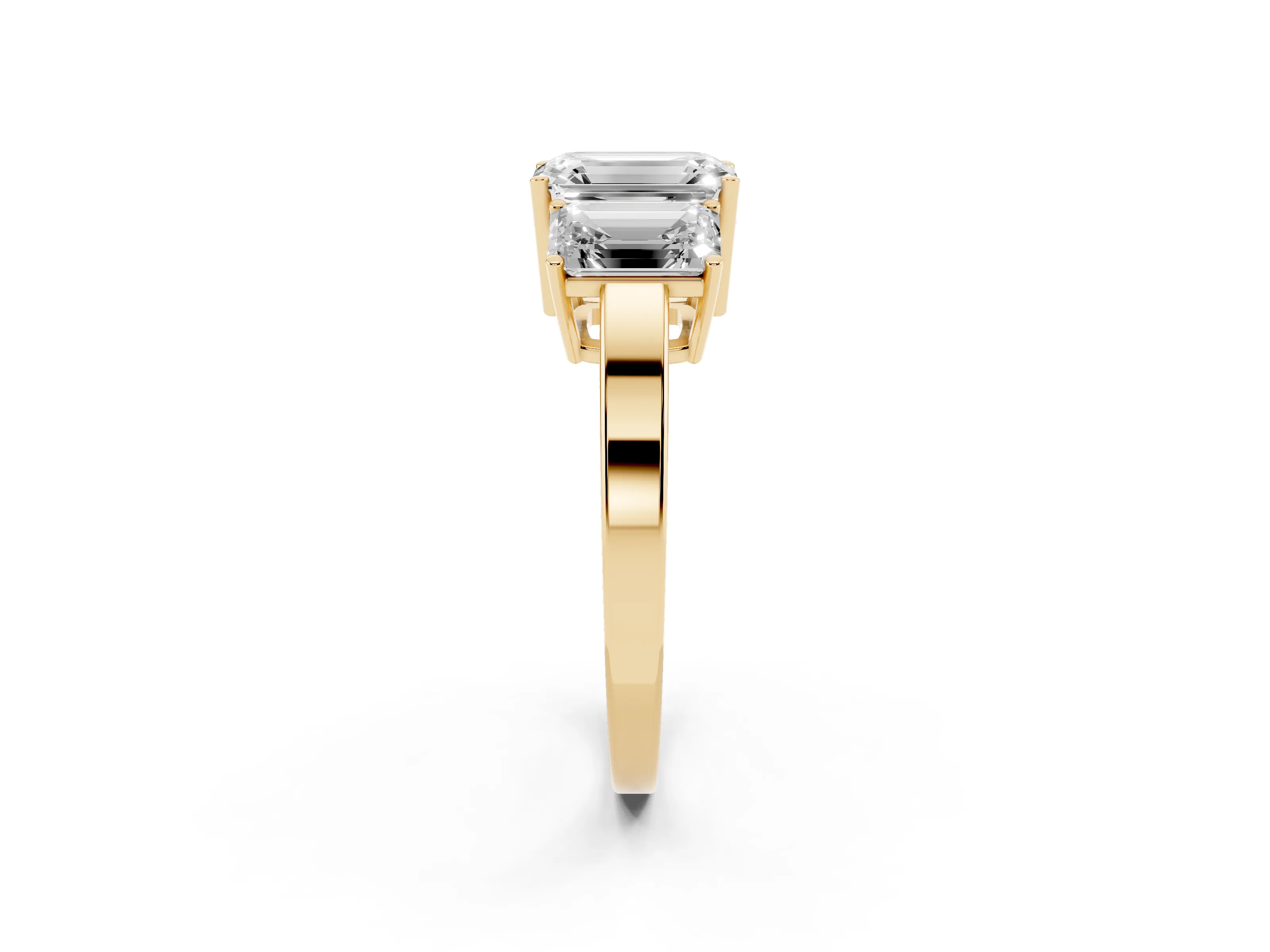 Emerald Cut Diamond Three-Stone Engagement Ring Set in Yellow gold with Flat Band