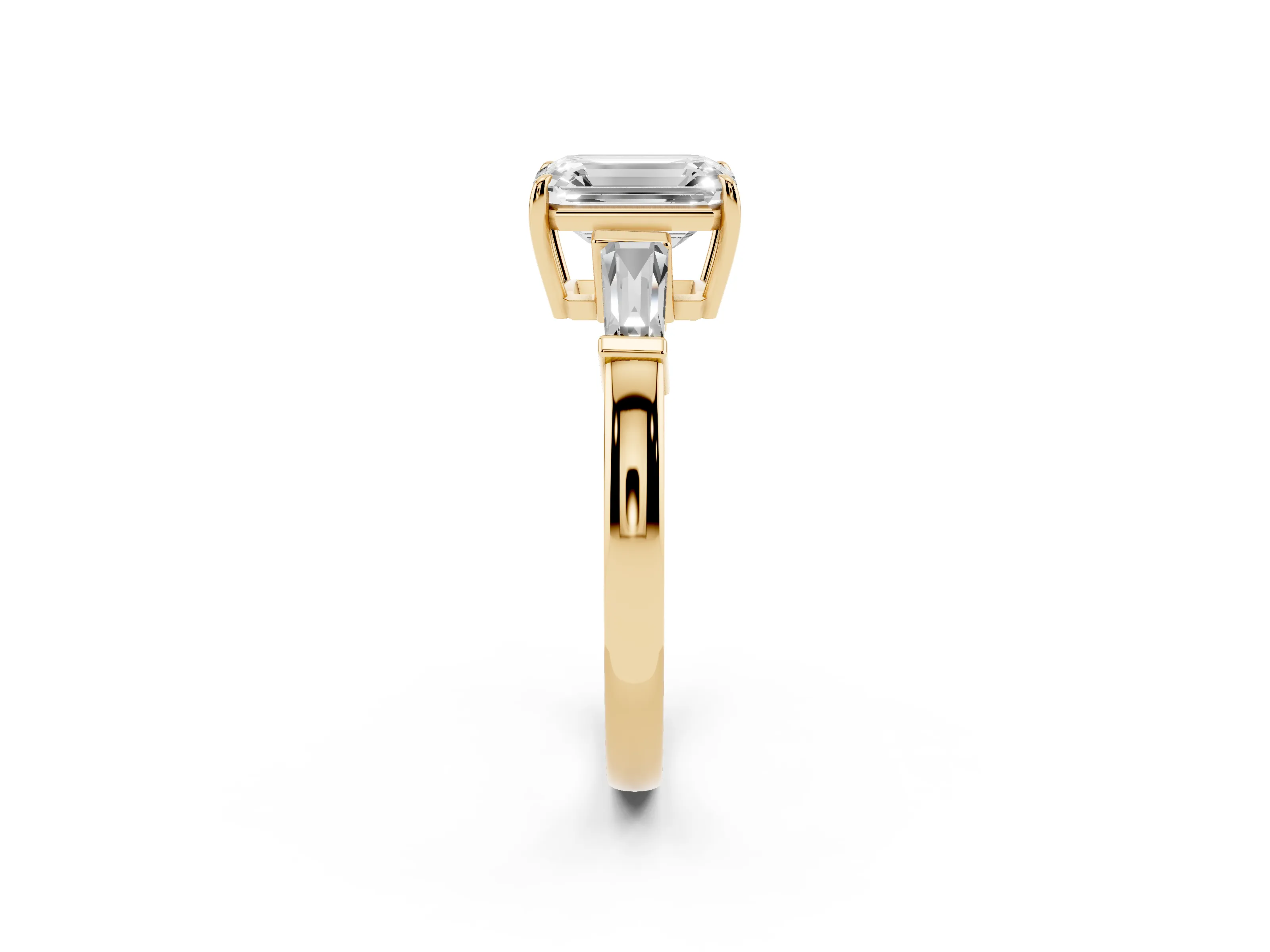Emerald Cut Diamond Three-Stone Ring Set in Yellow gold with Tapered Baguette Side Stones and Prong Setting