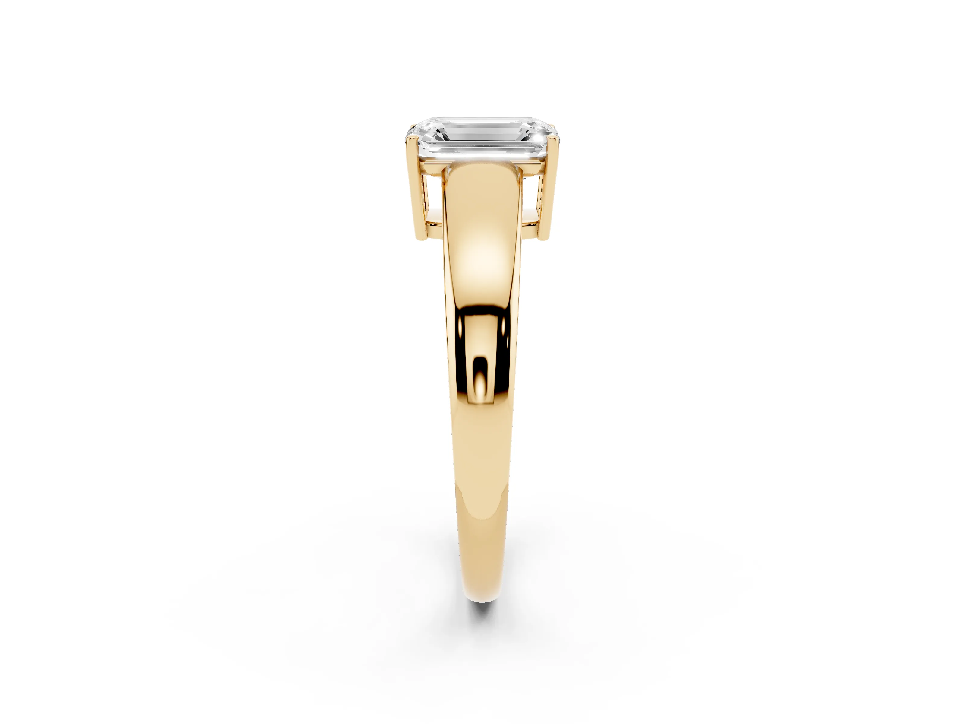 Emerald Cut Diamond Solitaire Ring Set in Yellow gold with Tapered Band and Prong Setting