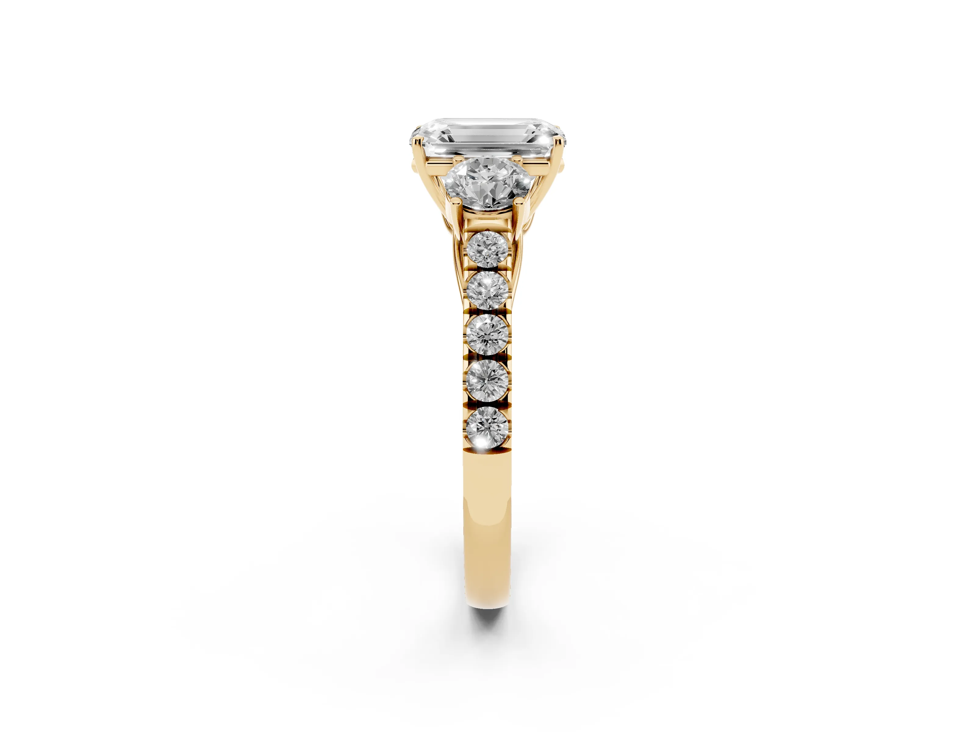 Emerald Cut Diamond Three-Stone Ring Set in Yellow gold with Round Side Stones and Delicate Pavé Band