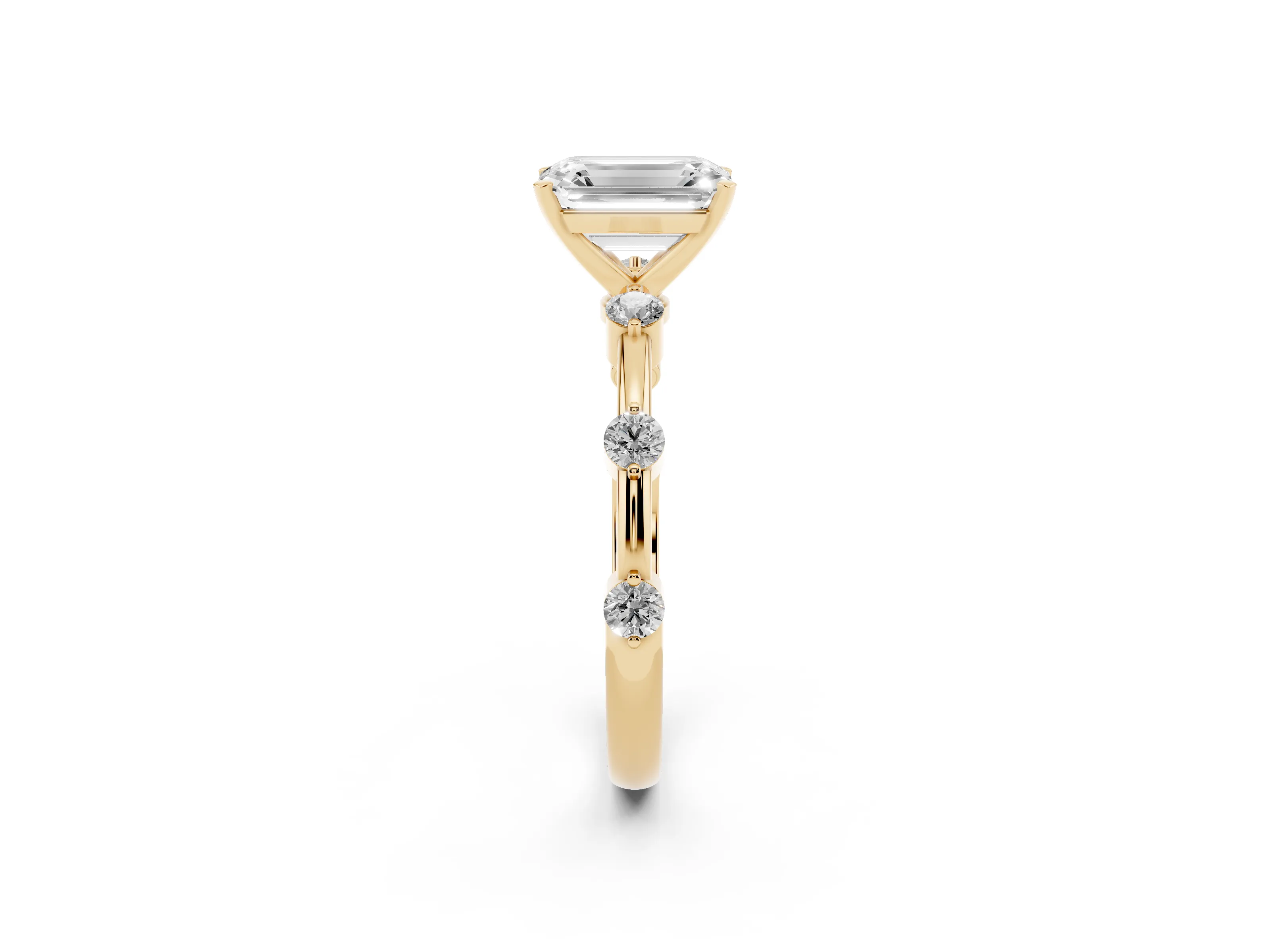 Emerald Cut Diamond Solitaire Ring Set in Yellow gold with Bezel Set Side Stones and Prong Setting