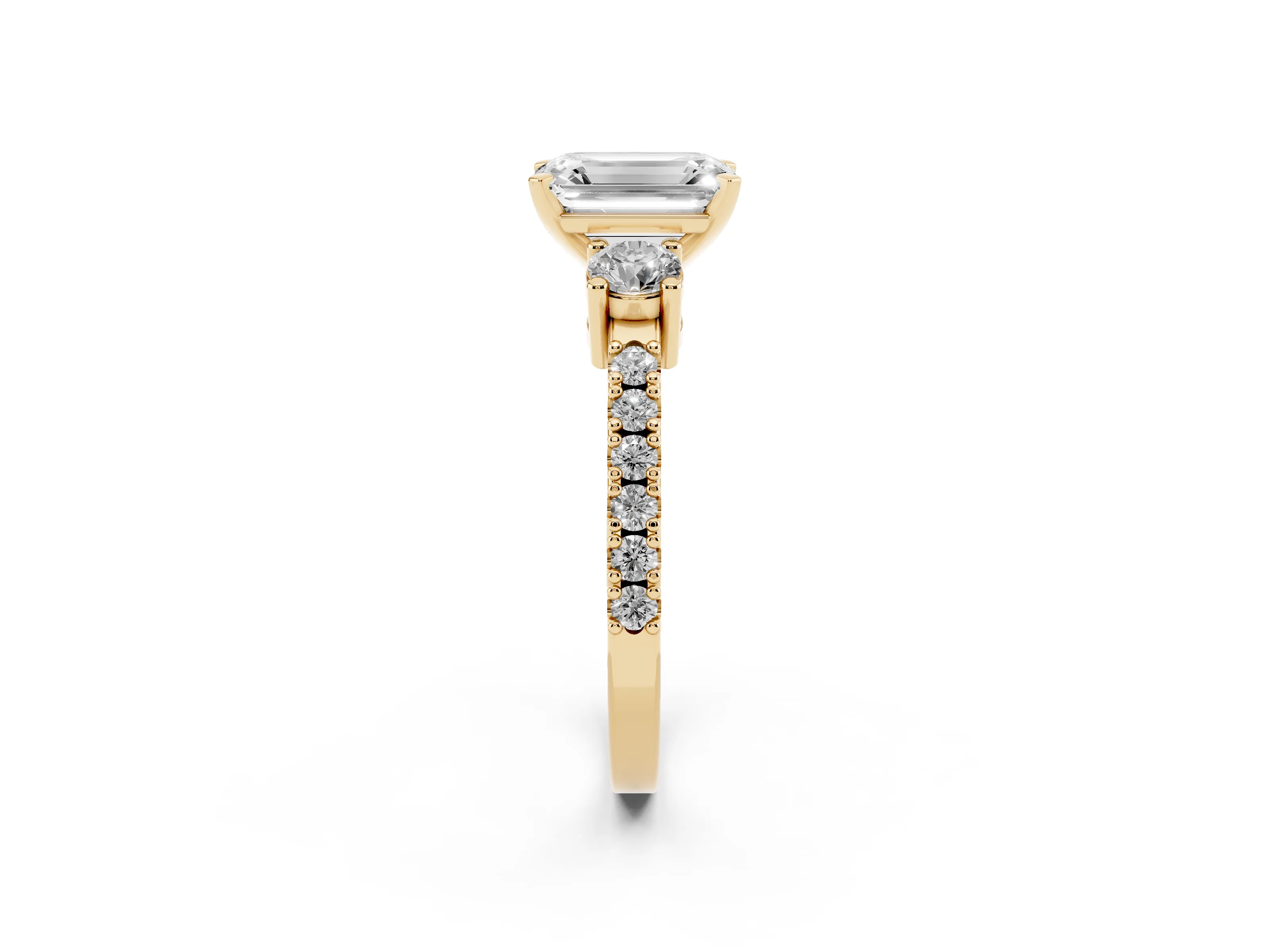 Three-Stone Emerald Cut Diamond Pavé Band Ring Set in Yellow gold with Prong Setting