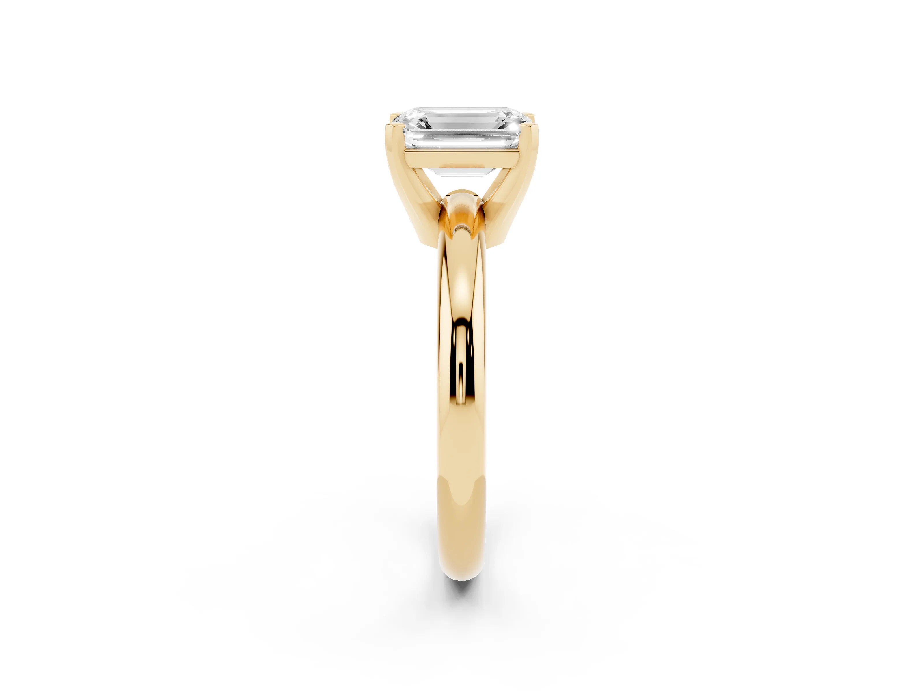 Emerald Cut Diamond Solitaire Engagement Ring Set in Yellow gold with Round Band and Prong Setting
