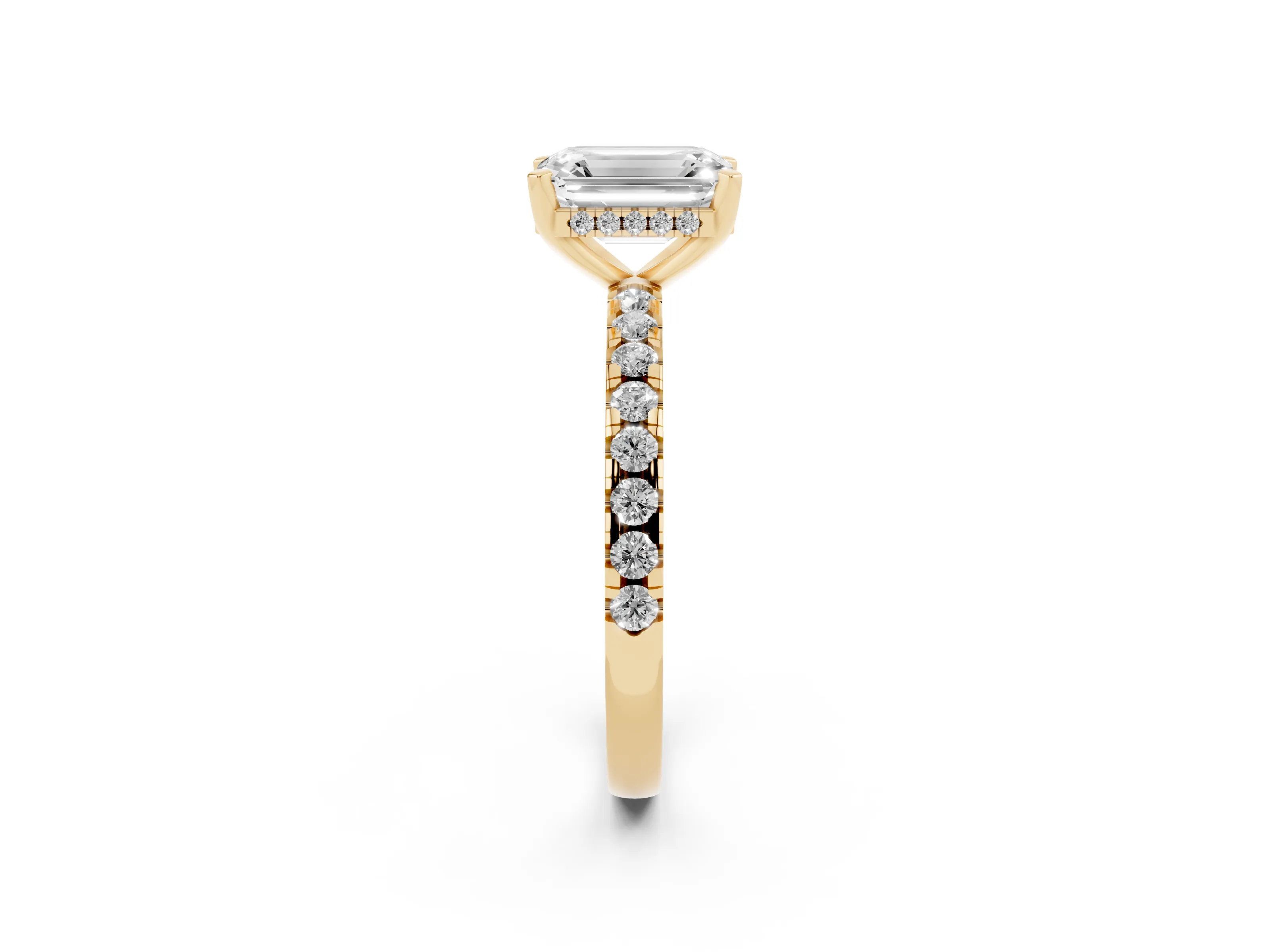 Emerald Cut Diamond Pavé Solitaire Ring Set in Yellow gold with Round Band Accents and Prong Setting