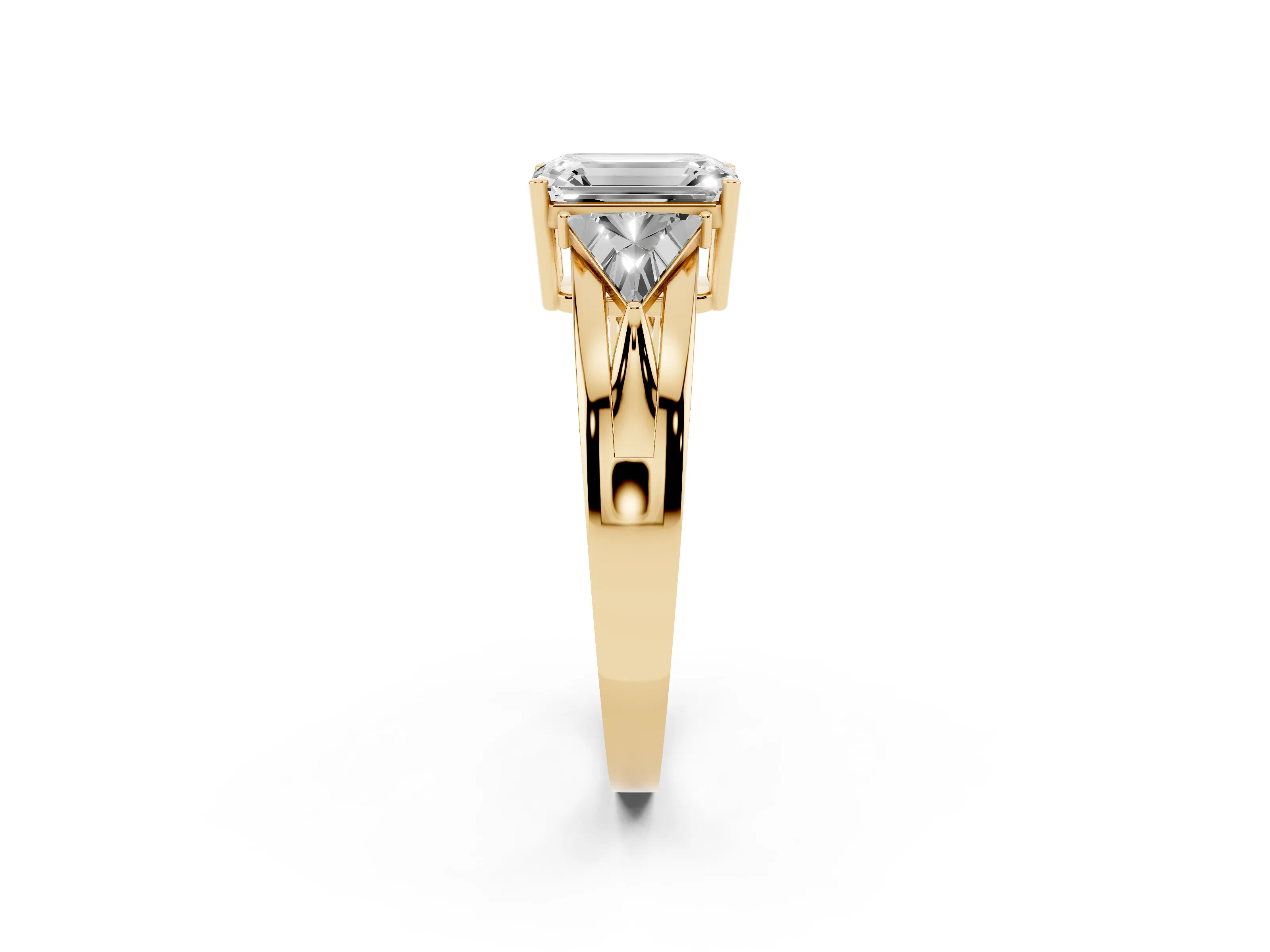 Emerald Cut Diamond Three-Stone Ring Set in Yellow gold with Trillion Side Stones and Split Shank