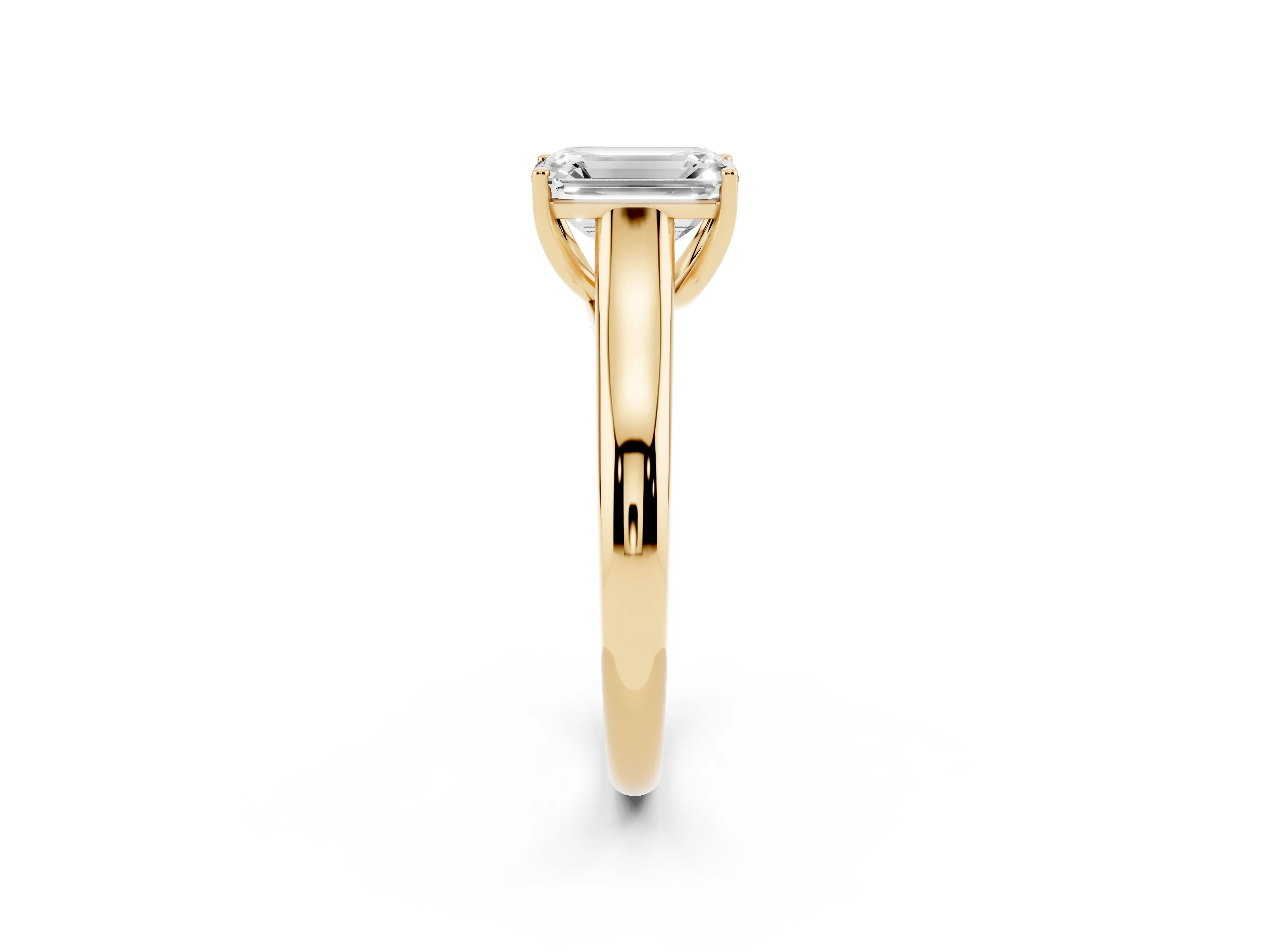 Emerald Cut Diamond Solitaire Engagement Ring Set in Yellow gold with Subtly Tapered Band and Prong Setting