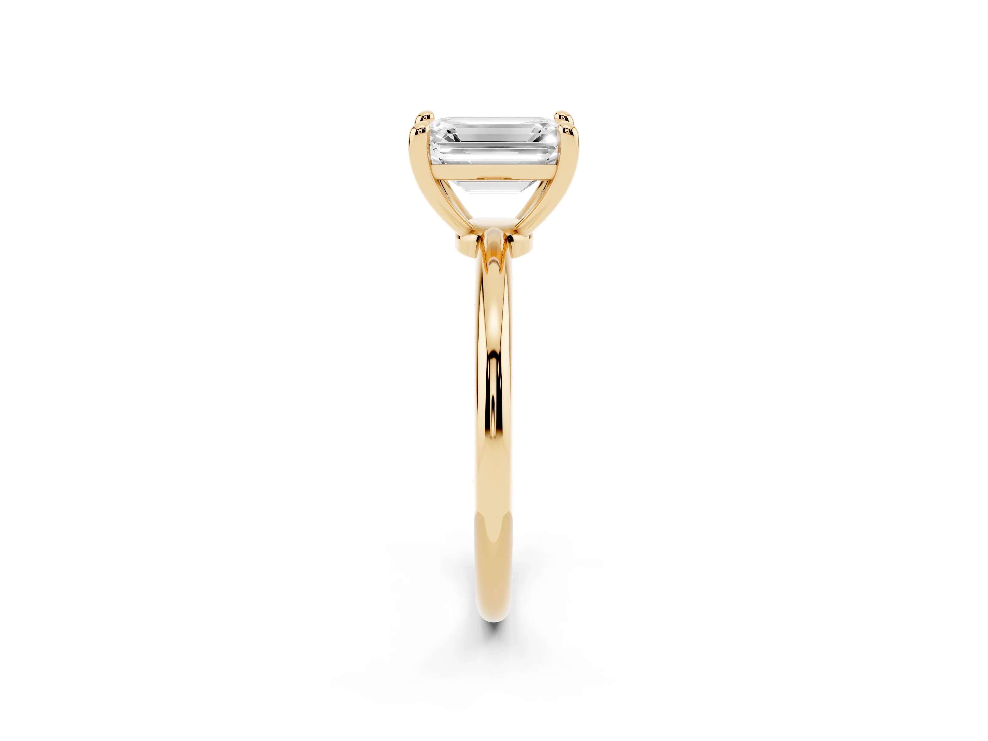 Emerald Cut Diamond Solitaire Ring Set in Yellow gold with Secure Prong Setting on a Classic Band