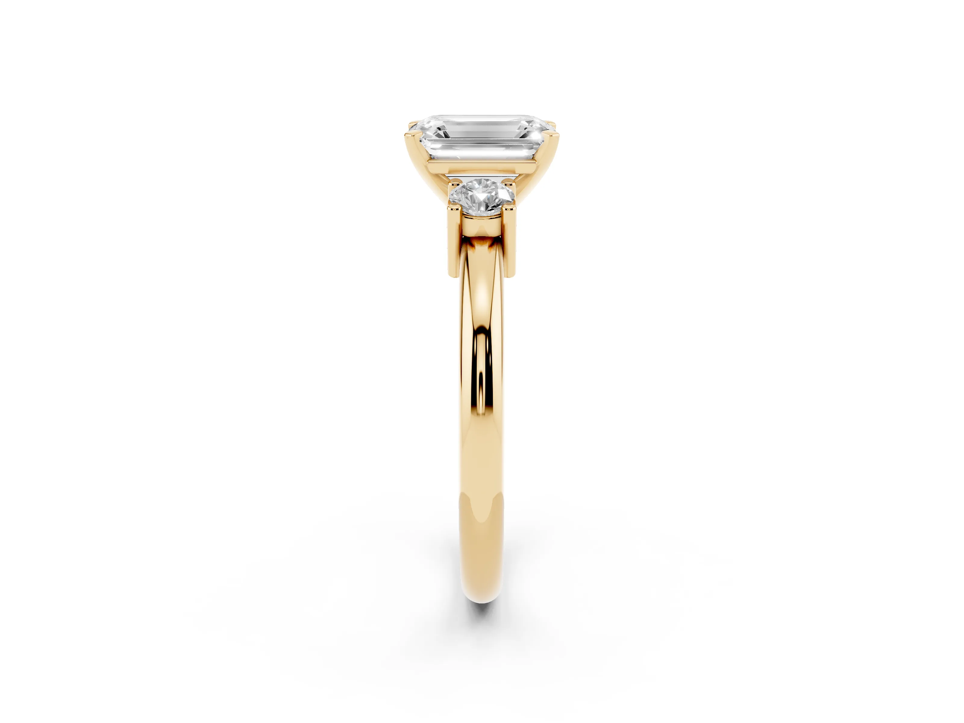 Three-Stone Emerald Cut Diamond Ring Set in Yellow gold with Prong Setting and Plain Band